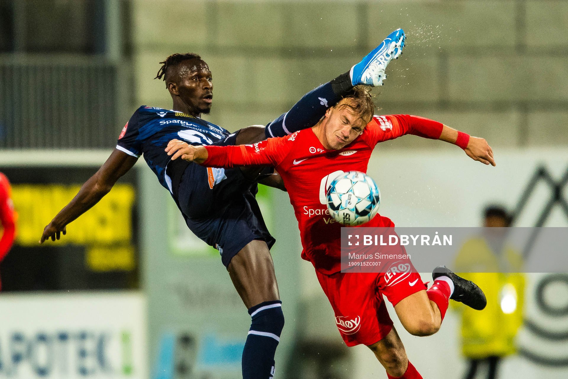 Amidou Diop of Kristiansund and Petter Dahle Strand of Brann