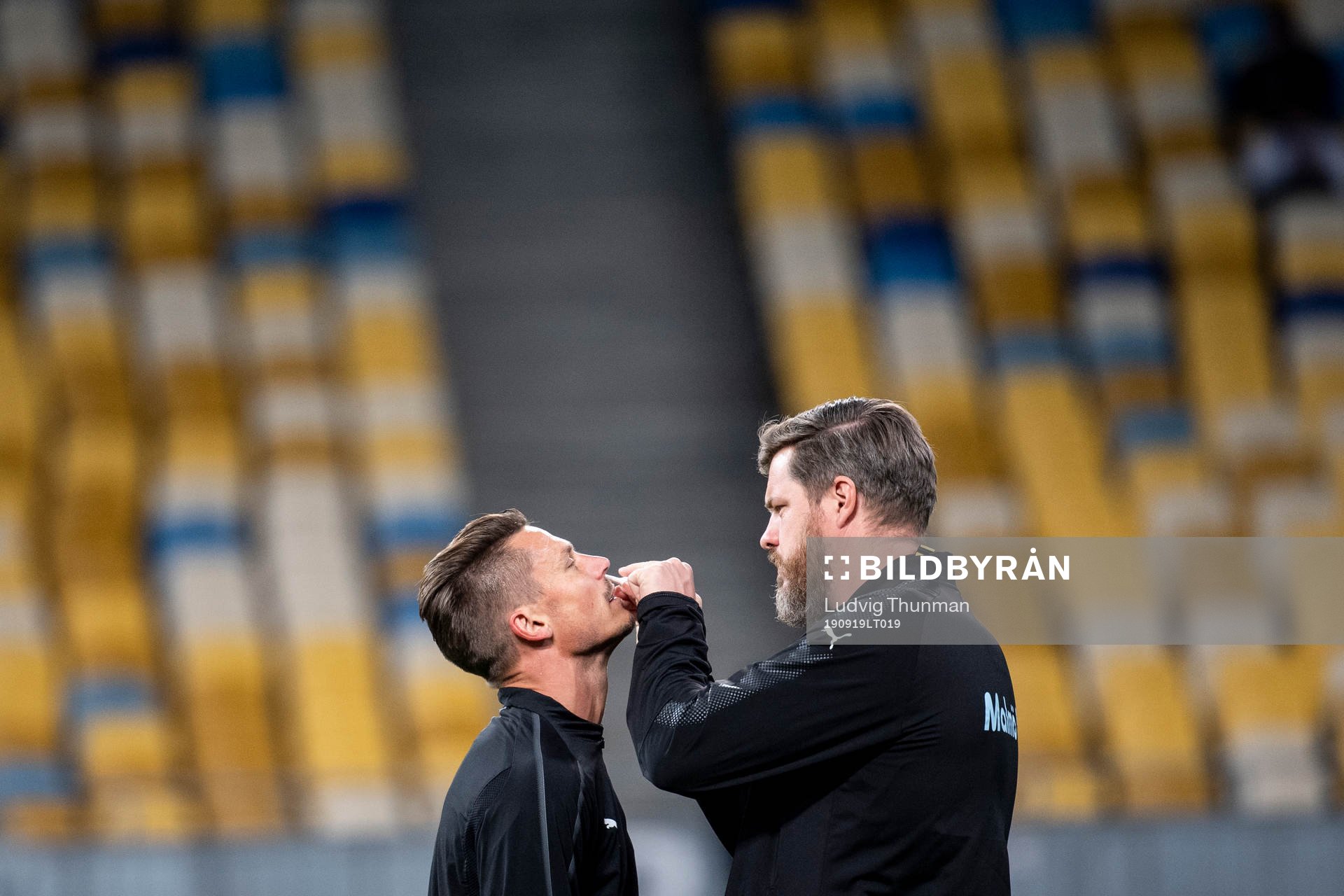 Markus Rosenberg receives treatment from Ola Svejme, team doctor of Malmö FF ahead of the Europa League match between Dynamo Kiev and Malmö FF September 19, 2019 in Kiev.