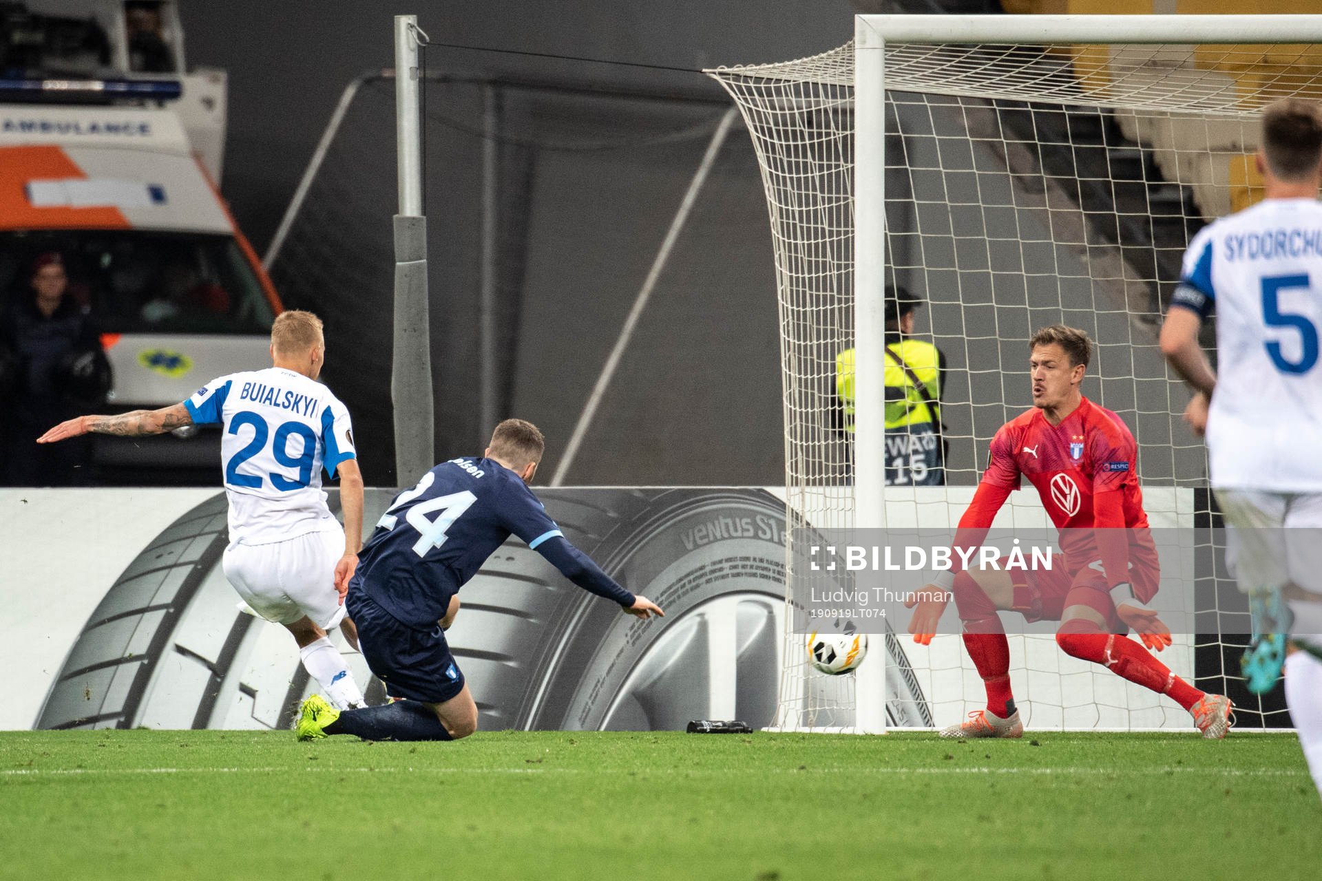 Vitaliy Buialskyi of Dinamo Kiev against Lasse Nielsen and goalkeeper Johan Dahlin of Malmö FF during the Europa League match between Dynamo Kiev and Malmö FF September 19, 2019 in Kiev.