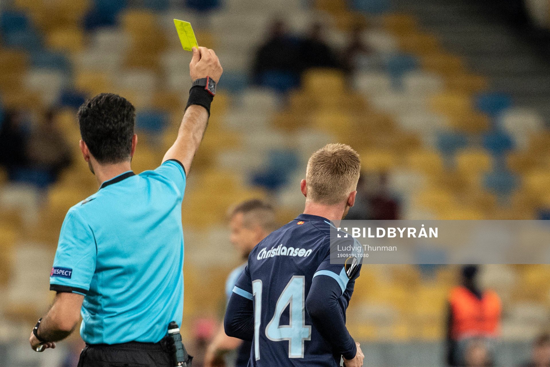 Anders Christiansen of Malmö FF receives a yellow card