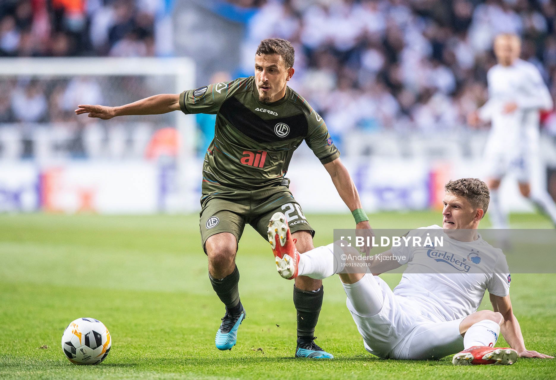 Olivier Custodio (20), FC Lugano and Jens Stage (6), FC