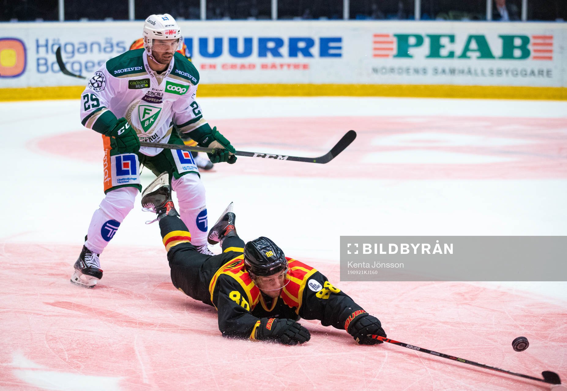 Färjestads Martin Johansson och Brynäs Jaedon Descheneau