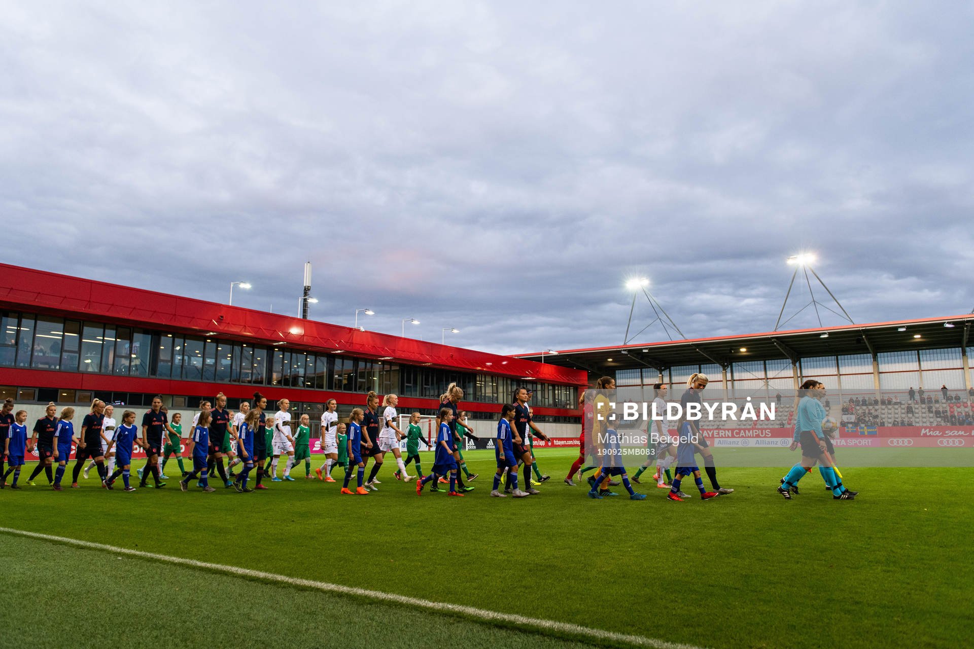 Players of Bayern Munich and of Göteborg enter the pitch