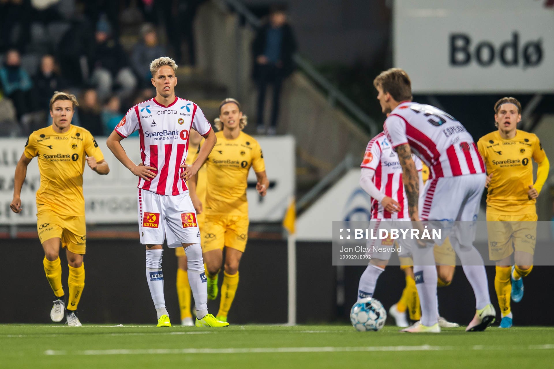 Eric Smith and Runar Espejord of Tromsø look dejected