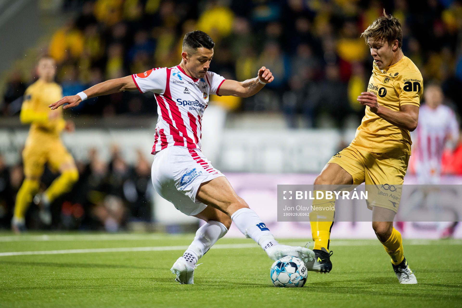 Fitim Azemi of Tromsø and Fredrik André Bjørkan of