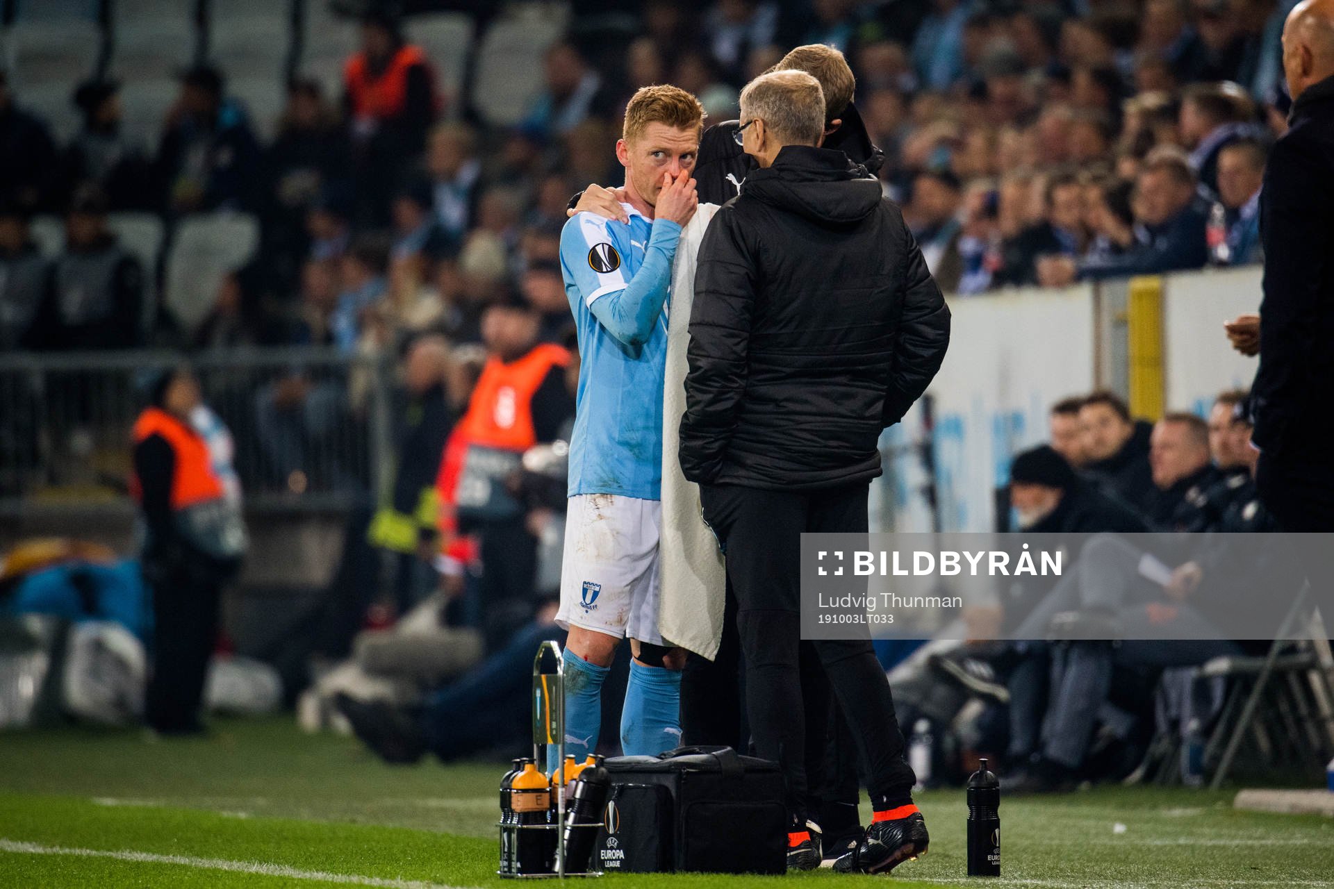 Anders Christiansen of Malmö FF is treaded by doctor Pär