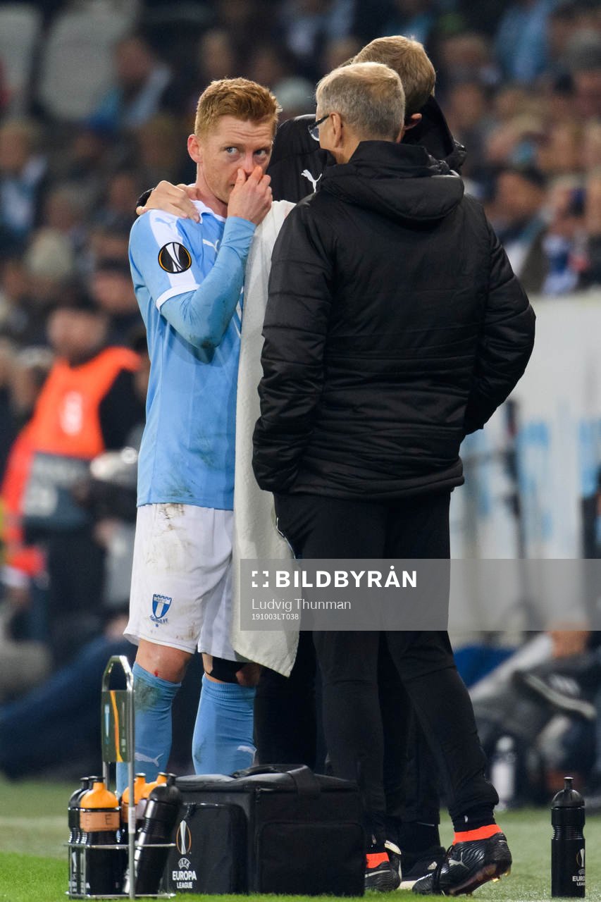 Anders Christiansen of Malmö FF cleans his face