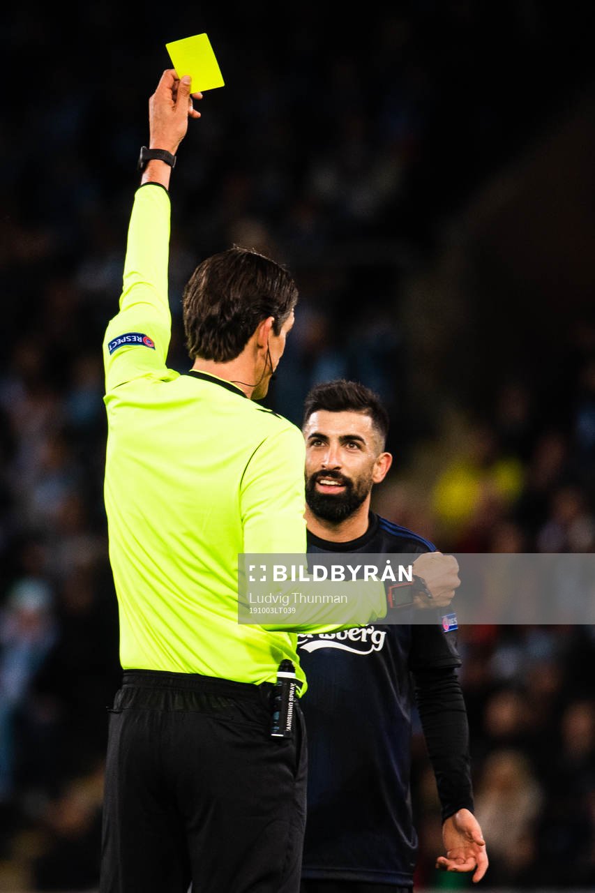Michael Santos of FC Köpenhamn recieves a yellow card