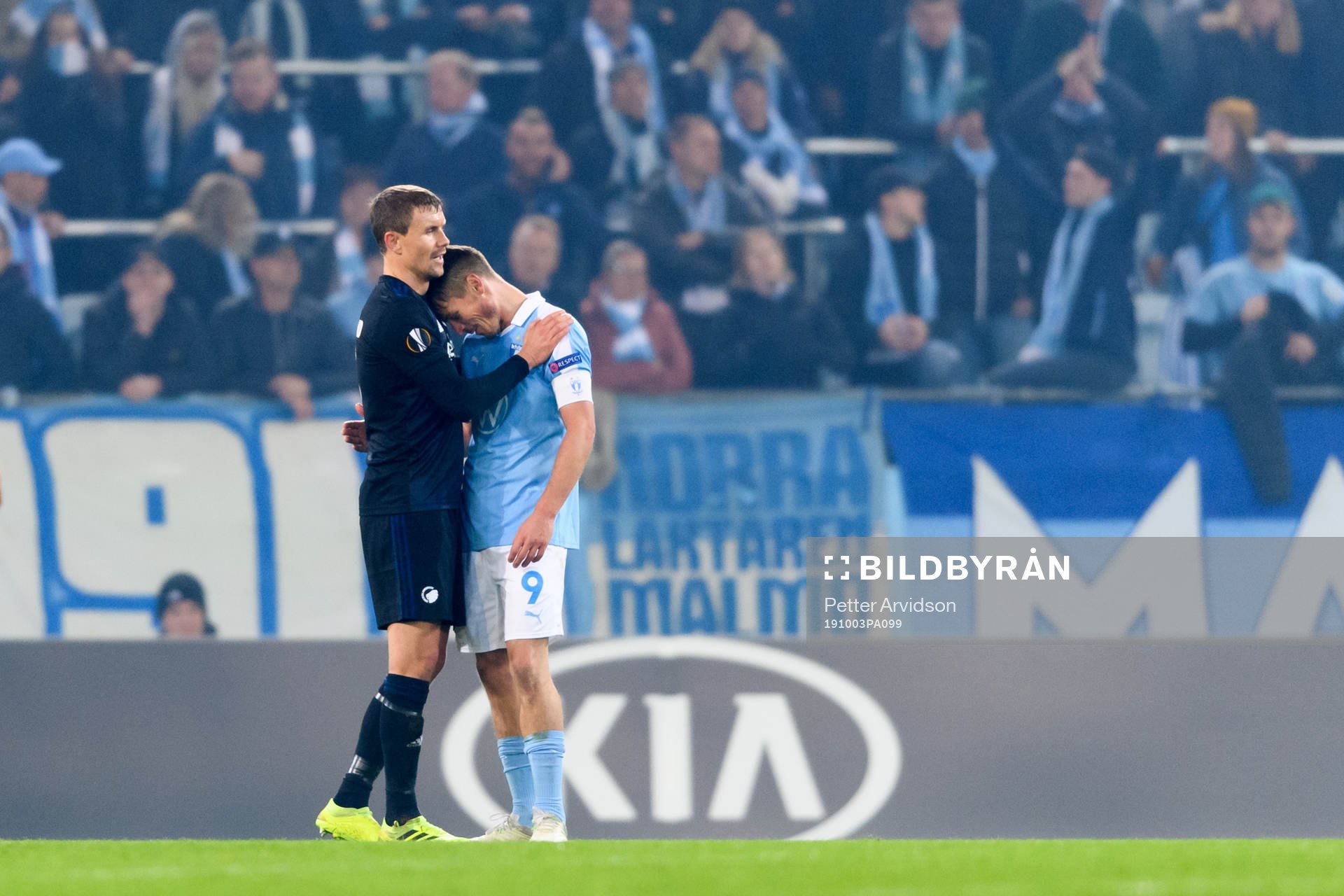 Andreas Bjelland of FC Köpenhamn hugs Markus Rosenberg of
