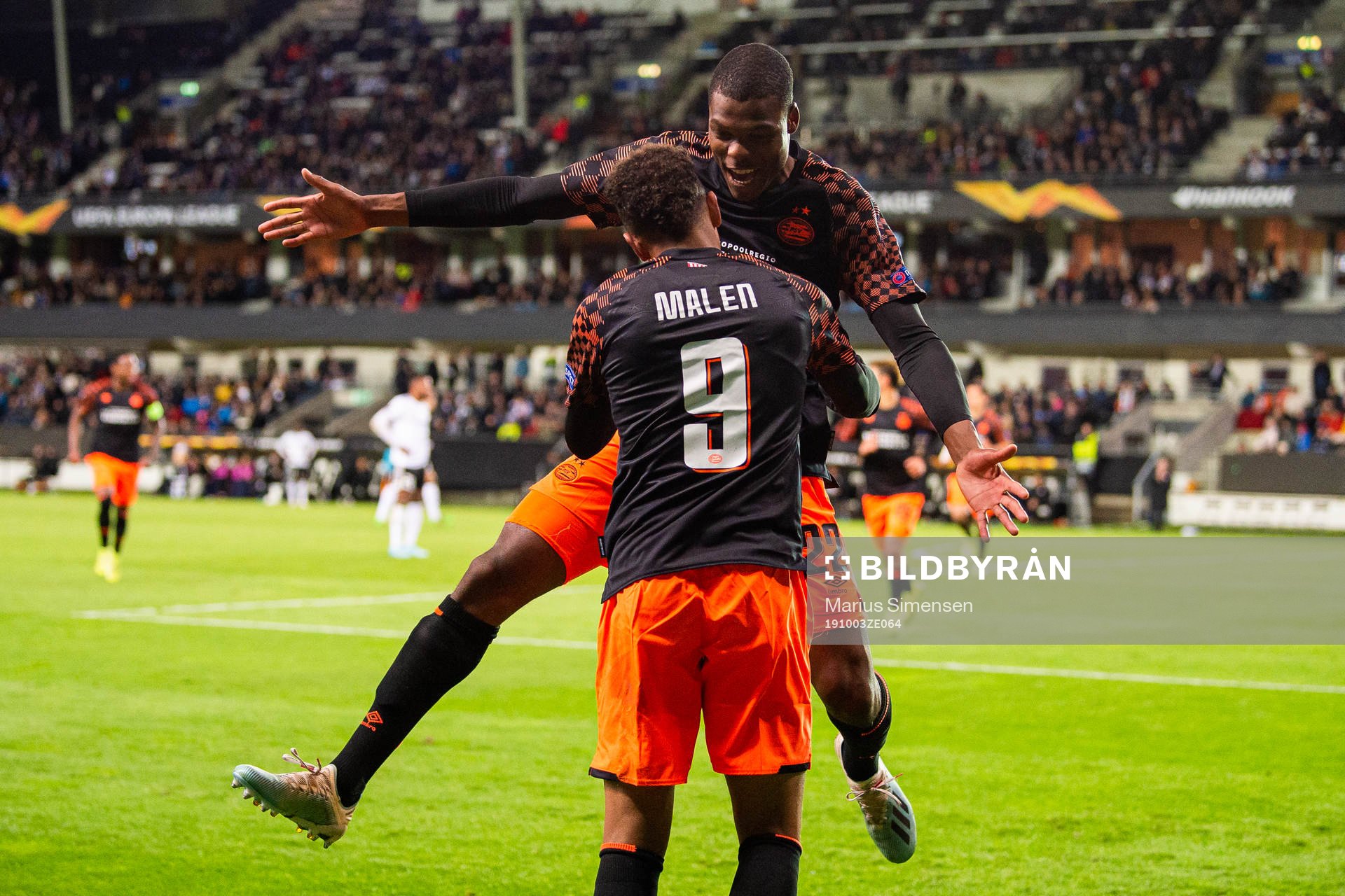 Donyell Malen of PSV Eindhoven celebrates with Denzel