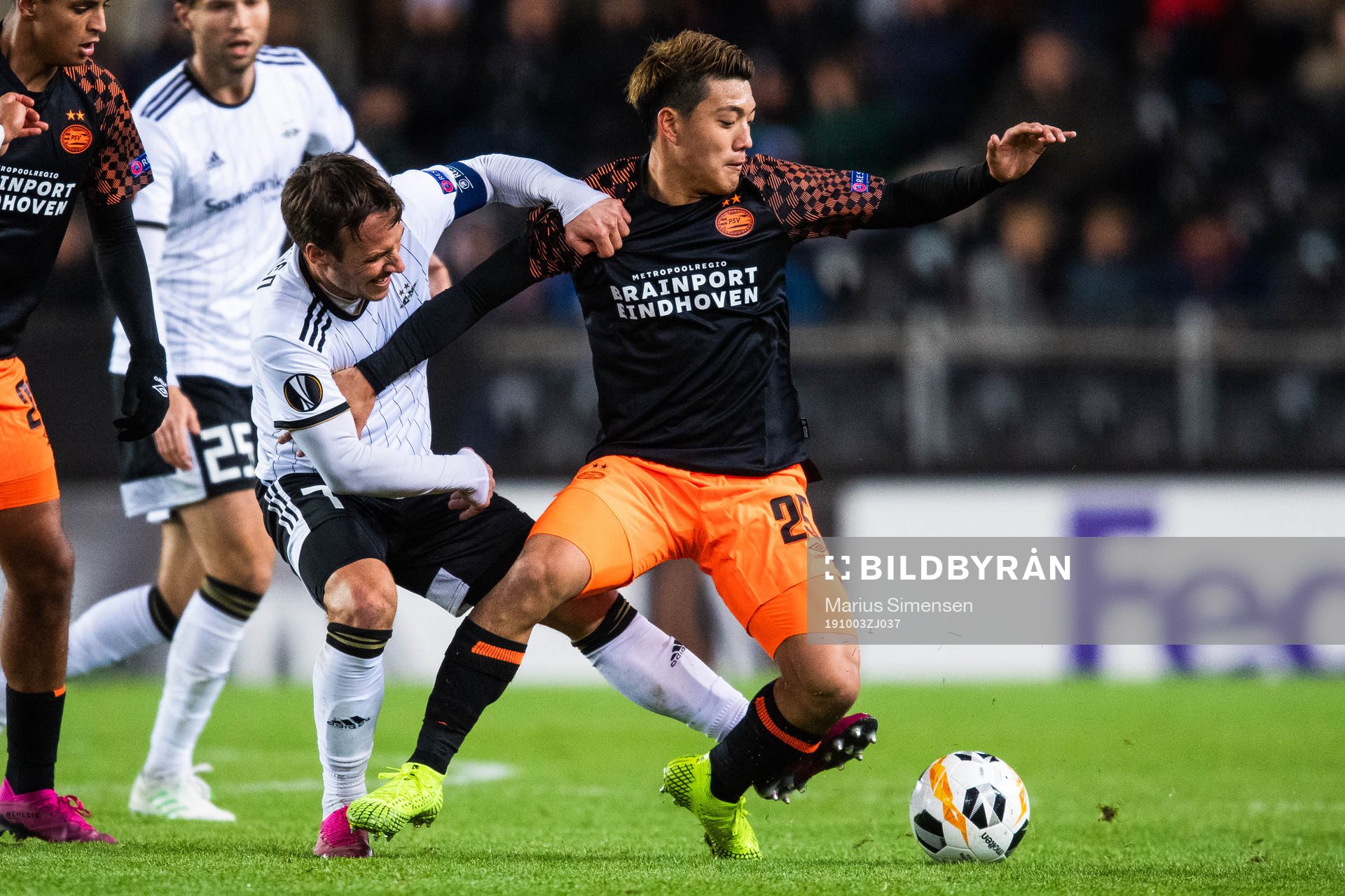 Mike Jensen of Rosenborg and Ritsu Doan of PSV Eindhoven