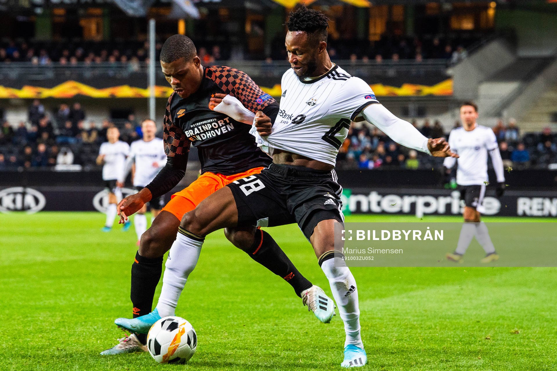 Denzel Dumfries of PSV Eindhoven and Samuel Adegbenro during the Europa League group stage match between Rosenborg and PSV Eindhoven on October 3, 2019 in Trondheim.