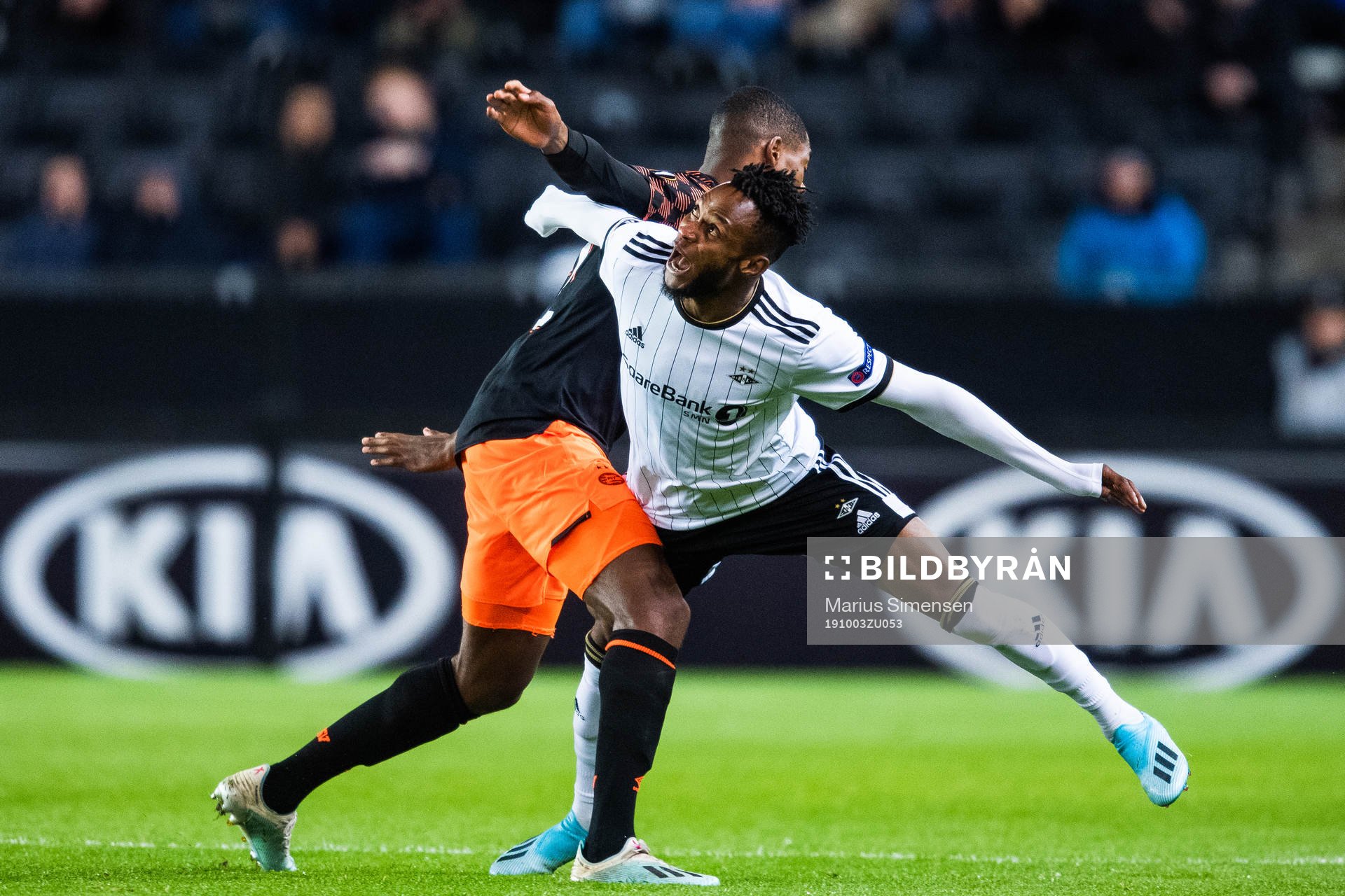 Denzel Dumfries of PSV Eindhoven and Samuel Adegbenro of