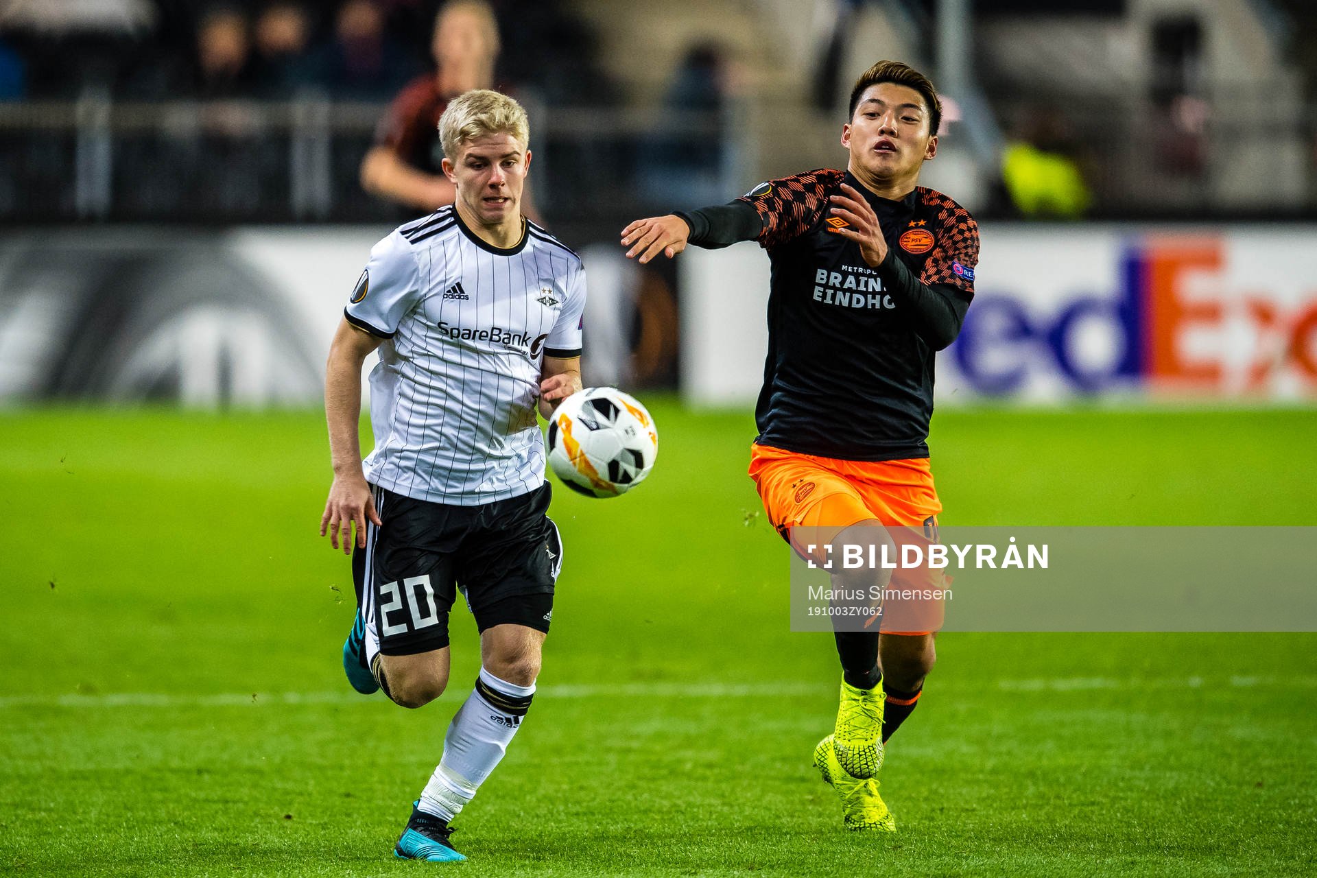 Edvard Tagseth of Rosenborg and Ritsu Doan of PSV Eindhoven
