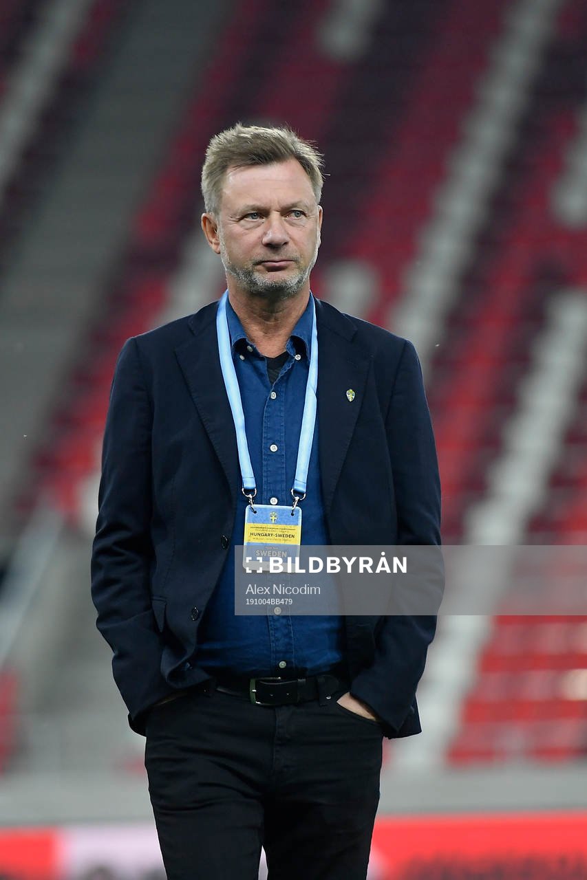 Peter Gerhardsson, head coach of Sweden, inspects the pitch