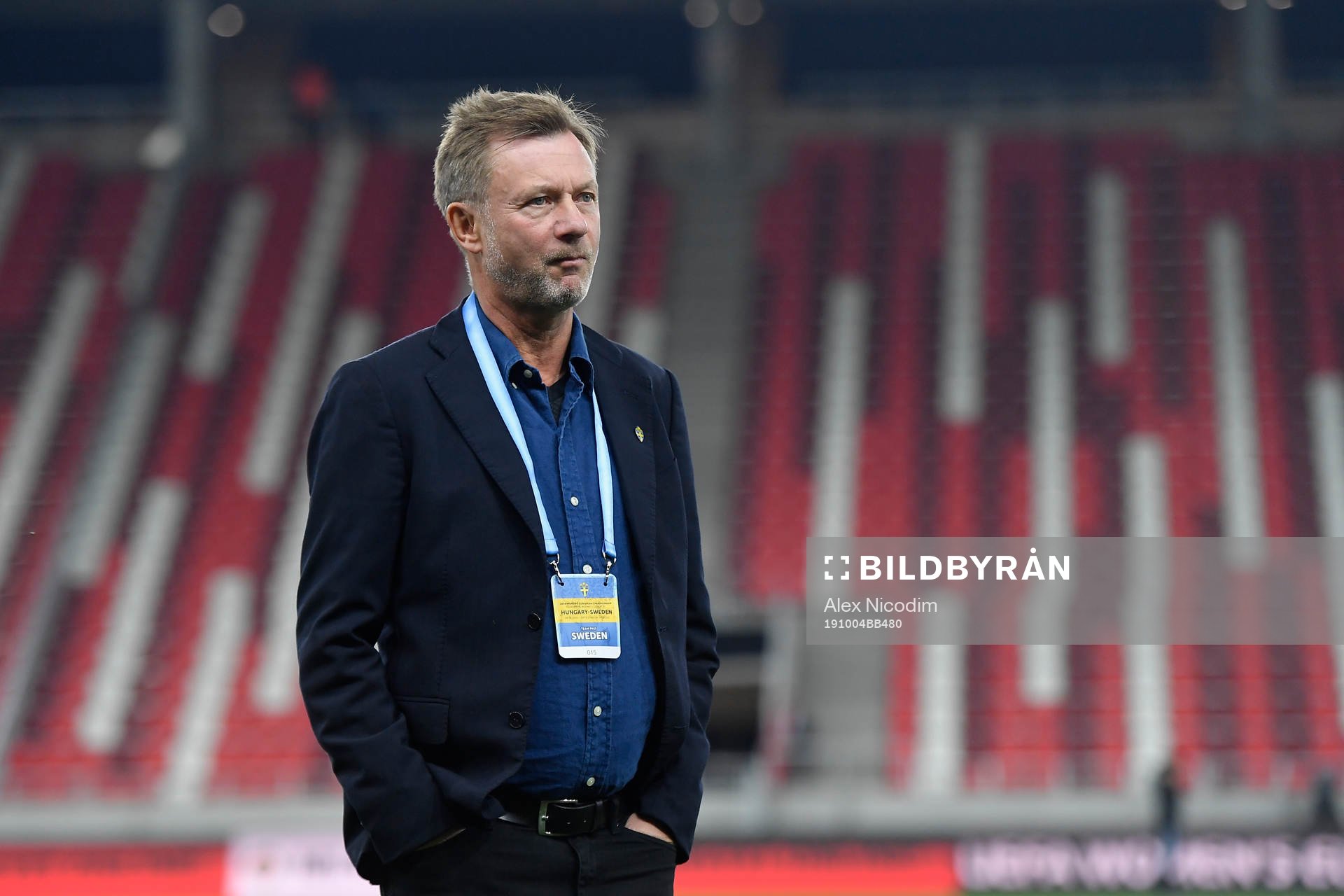 Peter Gerhardsson, head coach of Sweden, inspects the pitch