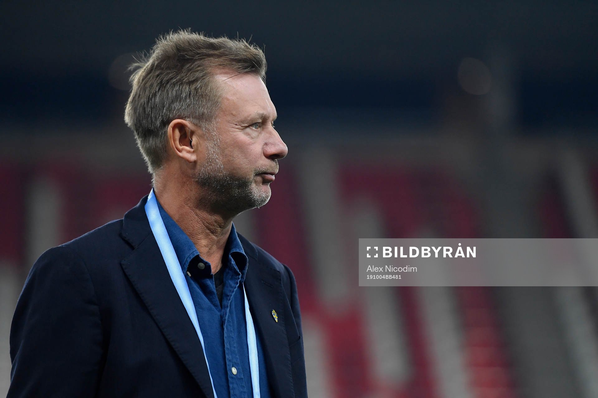 Peter Gerhardsson, head coach of Sweden, inspects the pitch