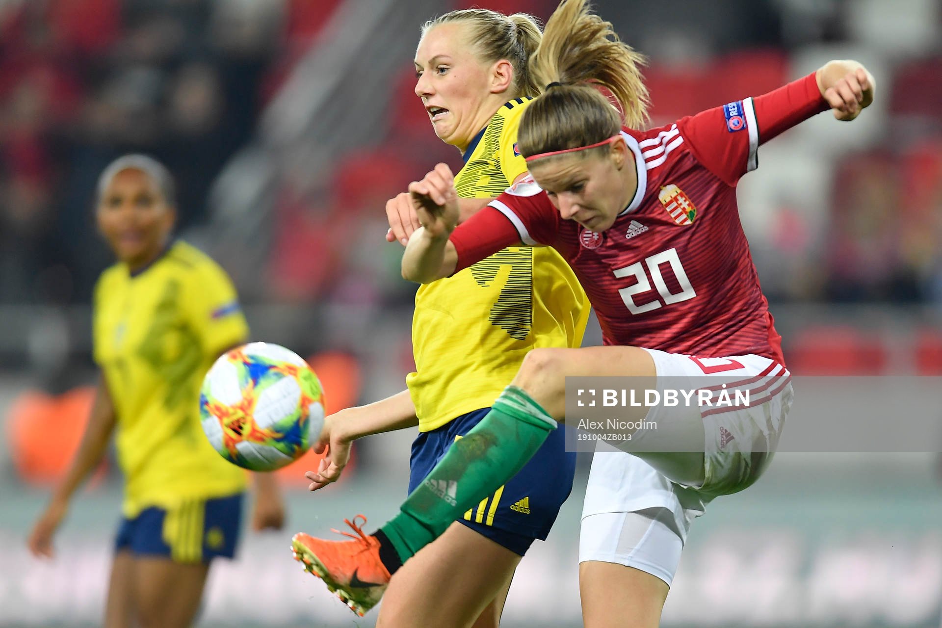 Stina Blackstenius of Sweden vies against Lilla Turanyi of