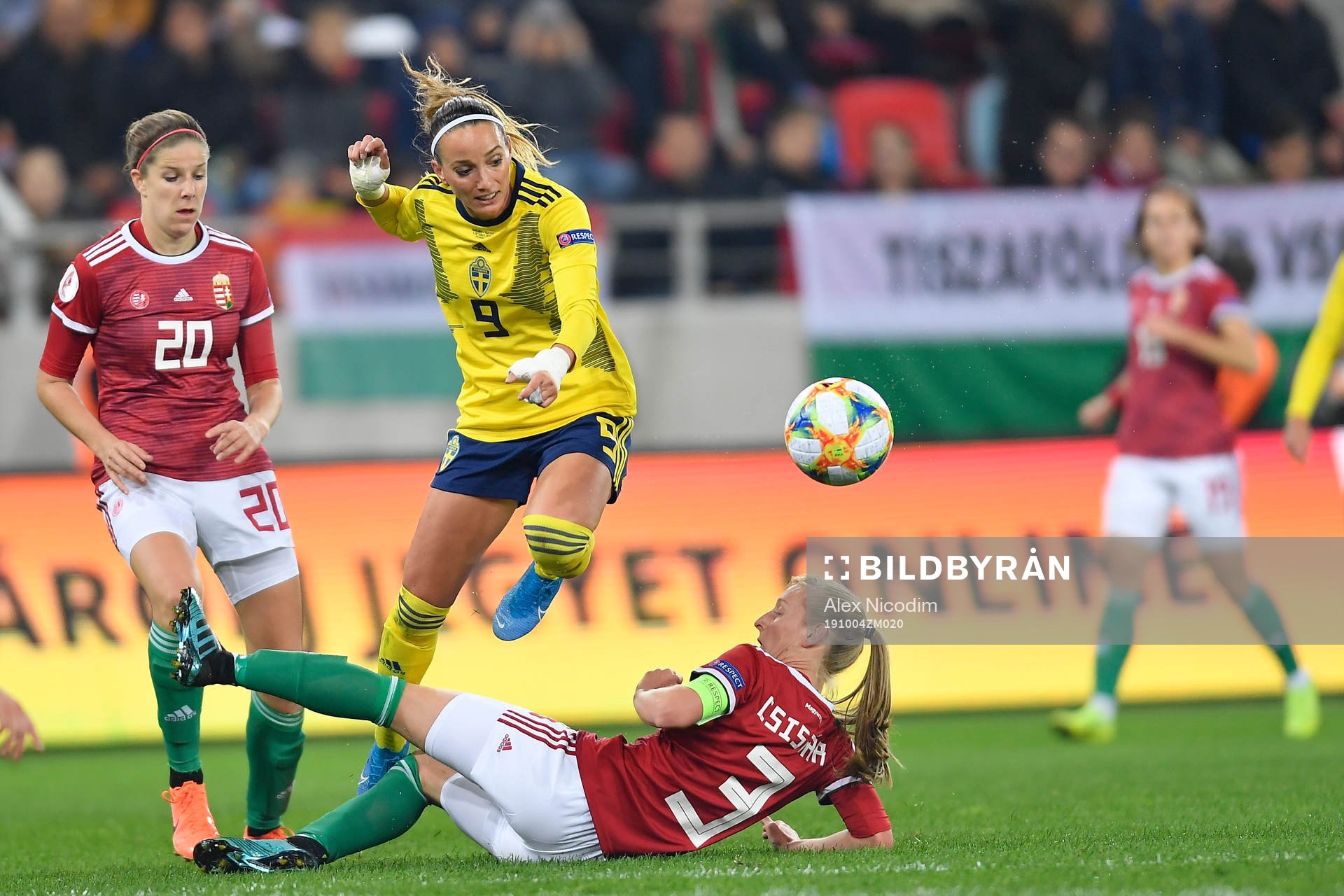 Kosovare Asllani of Sweden vies against Henrietta Csiszar