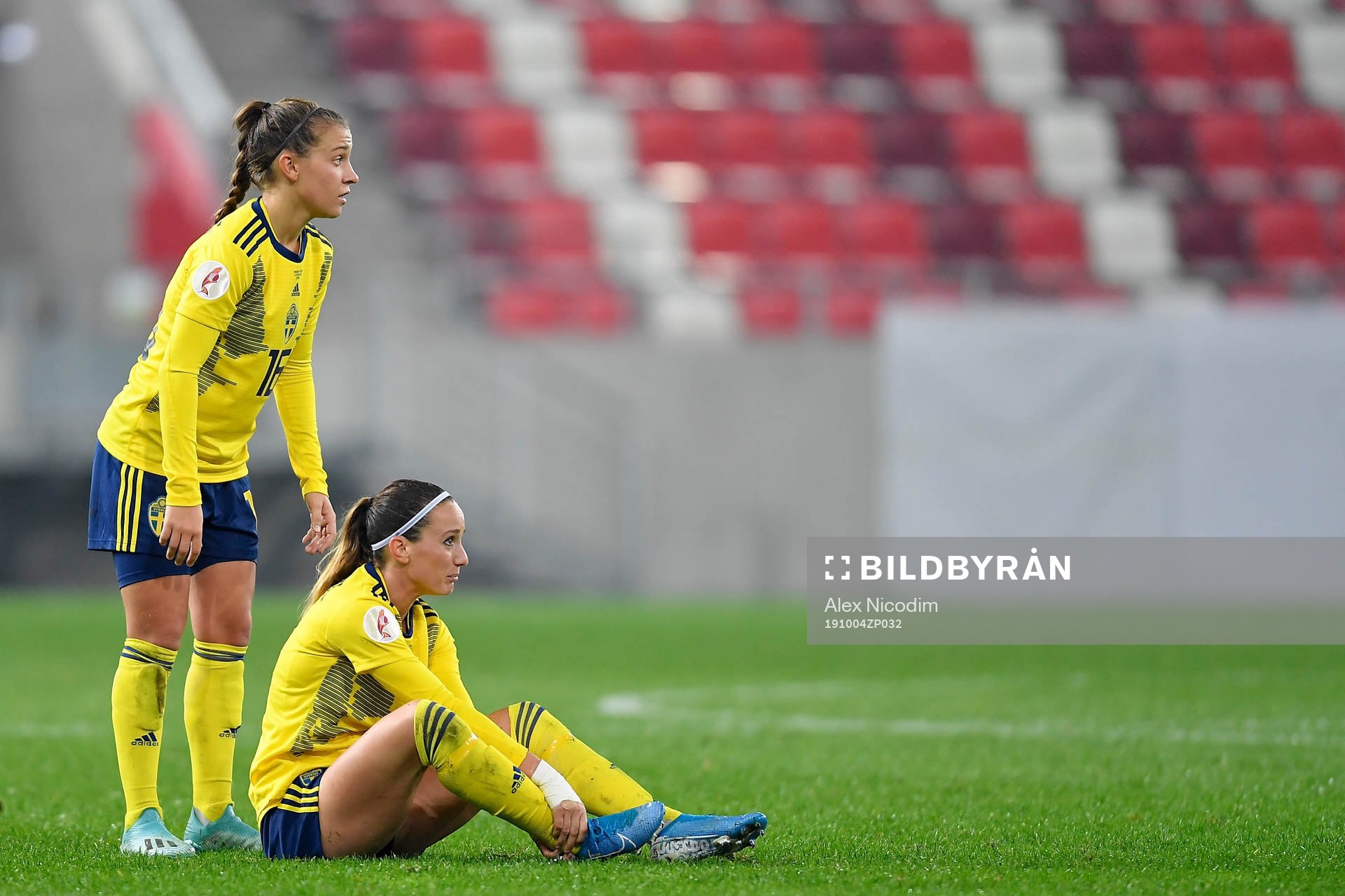 Kosovare Asllani and Julia Zigiotti Olme of Sweden react