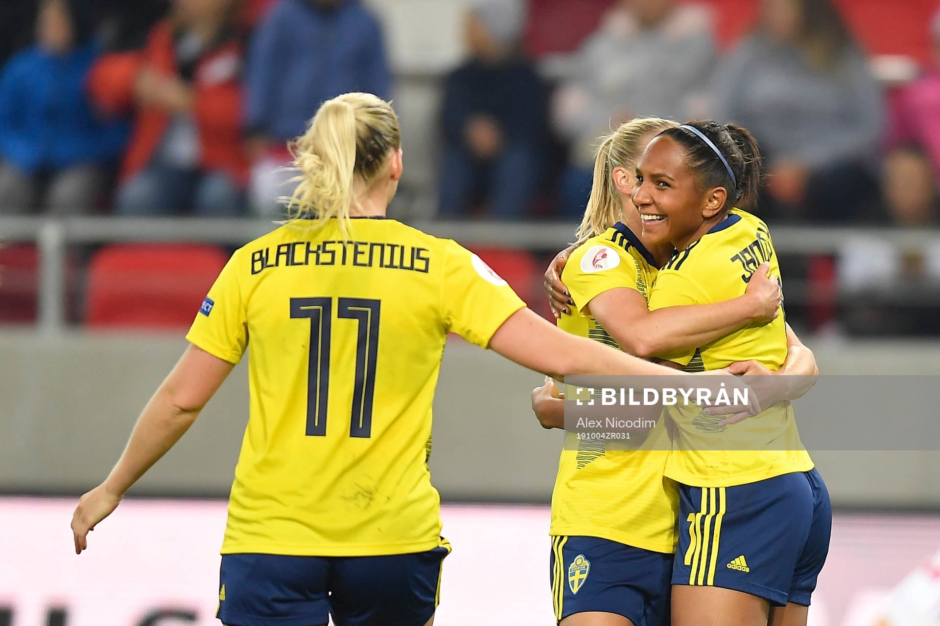 Madelen Janogy and Stina Blackstenius of Sweden celebrate
