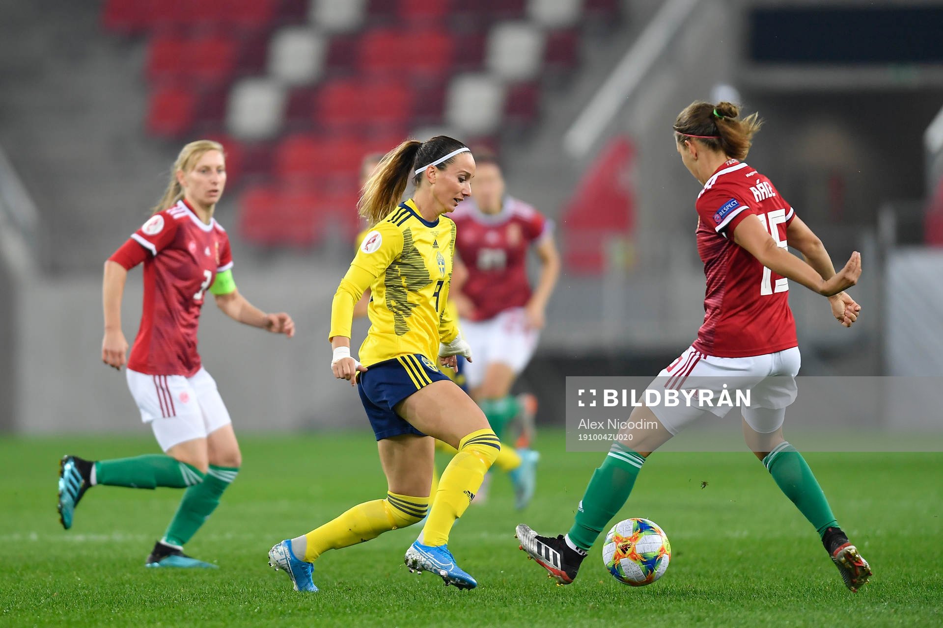 Kosovare Asllani of Sweden vies against Nathalie Bjorn of