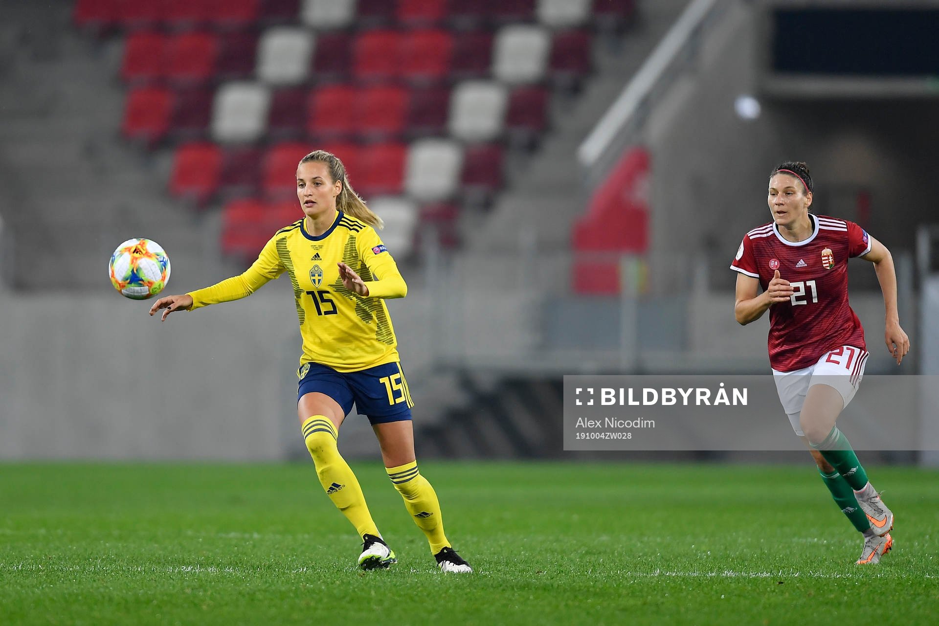 Nathalie Bjorn of Sweden vies against  Bernadette Zagor of