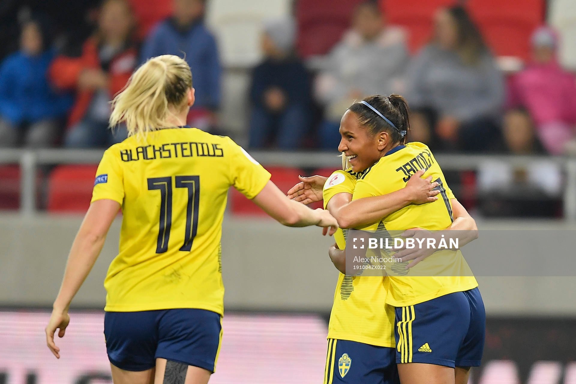 Madelen Janogy and Stina Blackstenius of Sweden celebrate