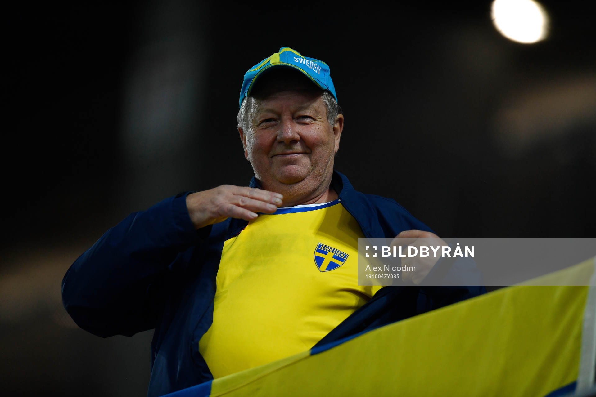 Sweden's supporter reacts