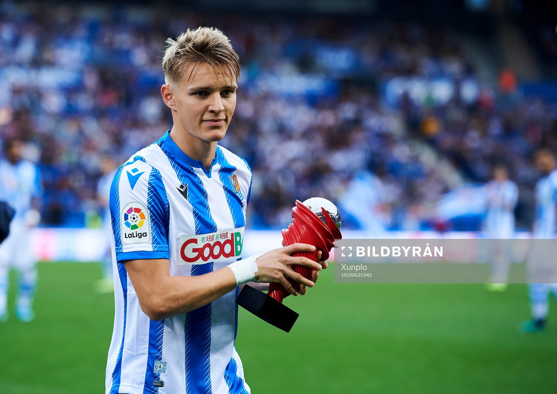 Xavi Prieto gives Martin Odegaard of Real Sociedad the