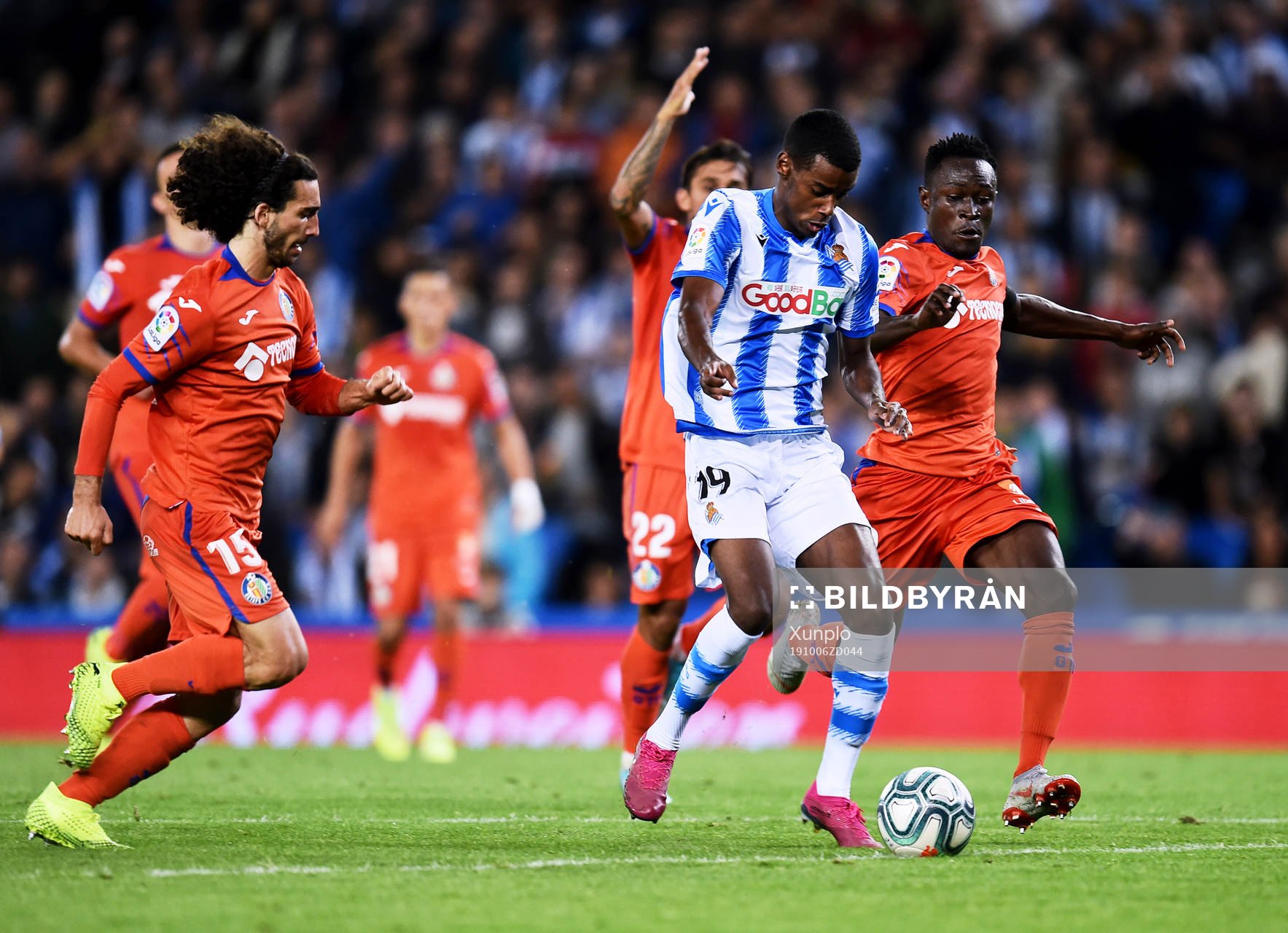 Alexander Isak of Real Sociedad battles for the ball with