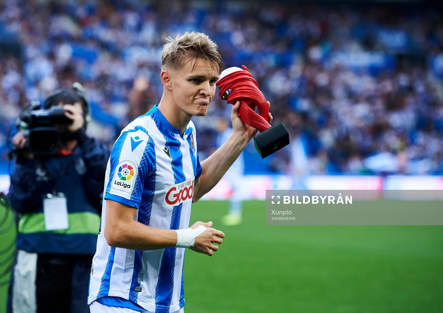 Xavi Prieto gives Martin Odegaard of Real Sociedad the
