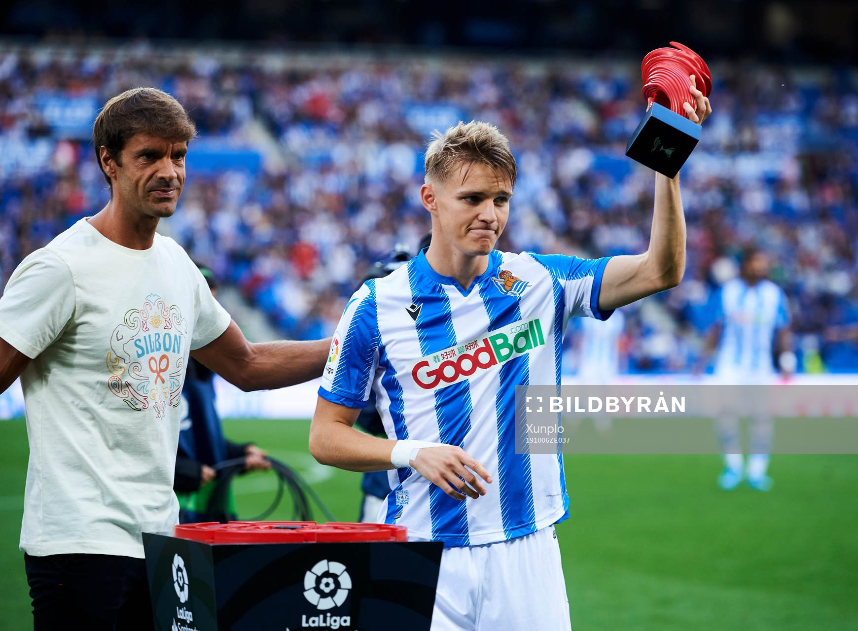 Xavi Prieto gives Martin Odegaard of Real Sociedad the