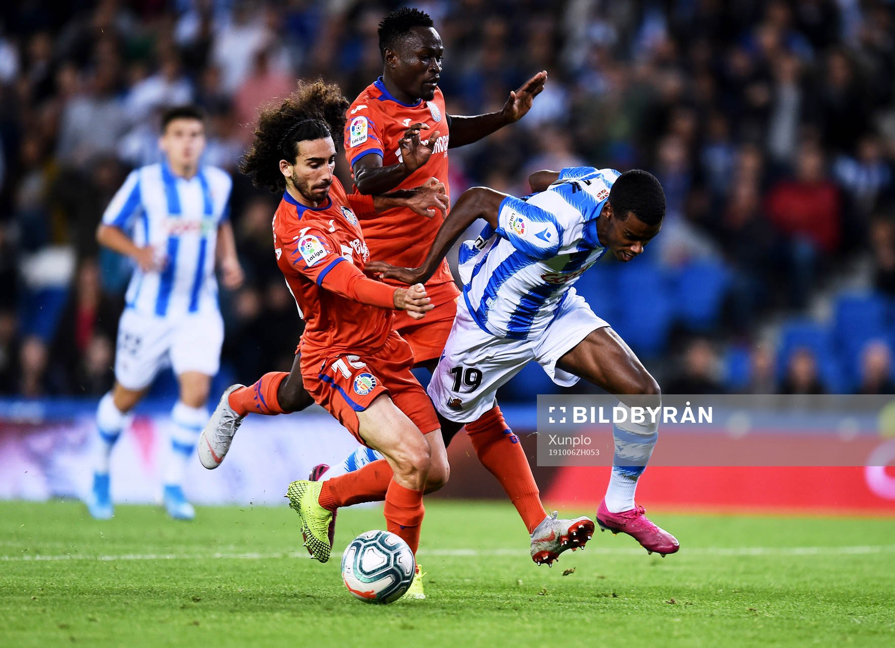 Alexander Isak of Real Sociedad battles for the ball with