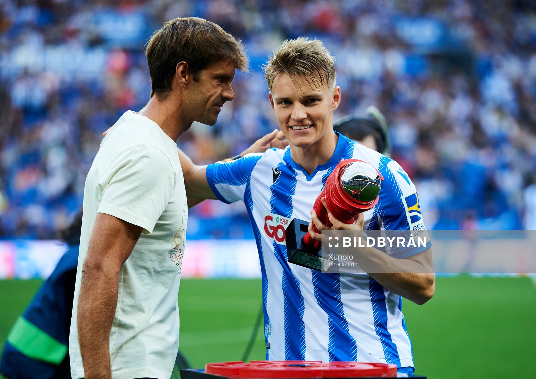 Xavi Prieto gives Martin Odegaard of Real Sociedad the