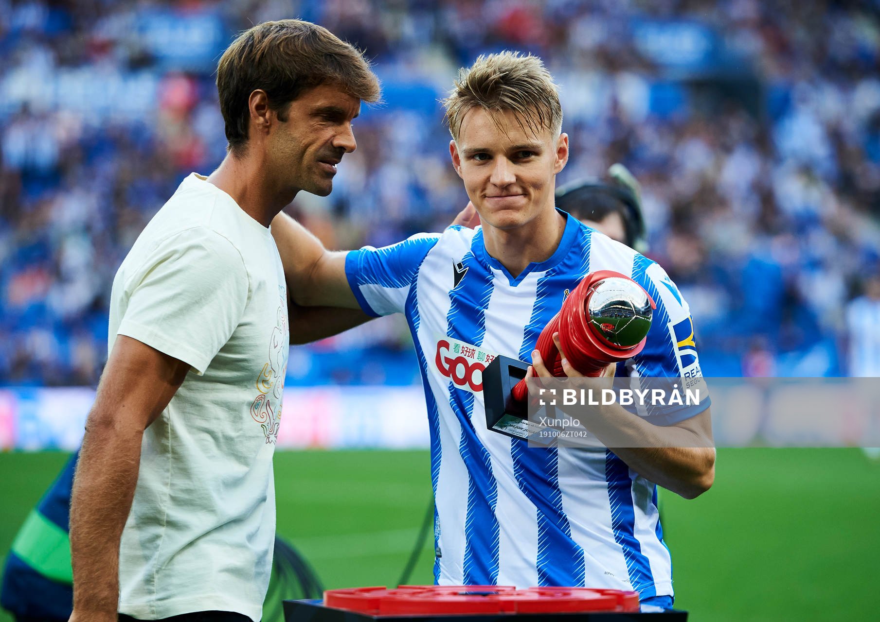 Xavi Prieto gives Martin Odegaard of Real Sociedad the