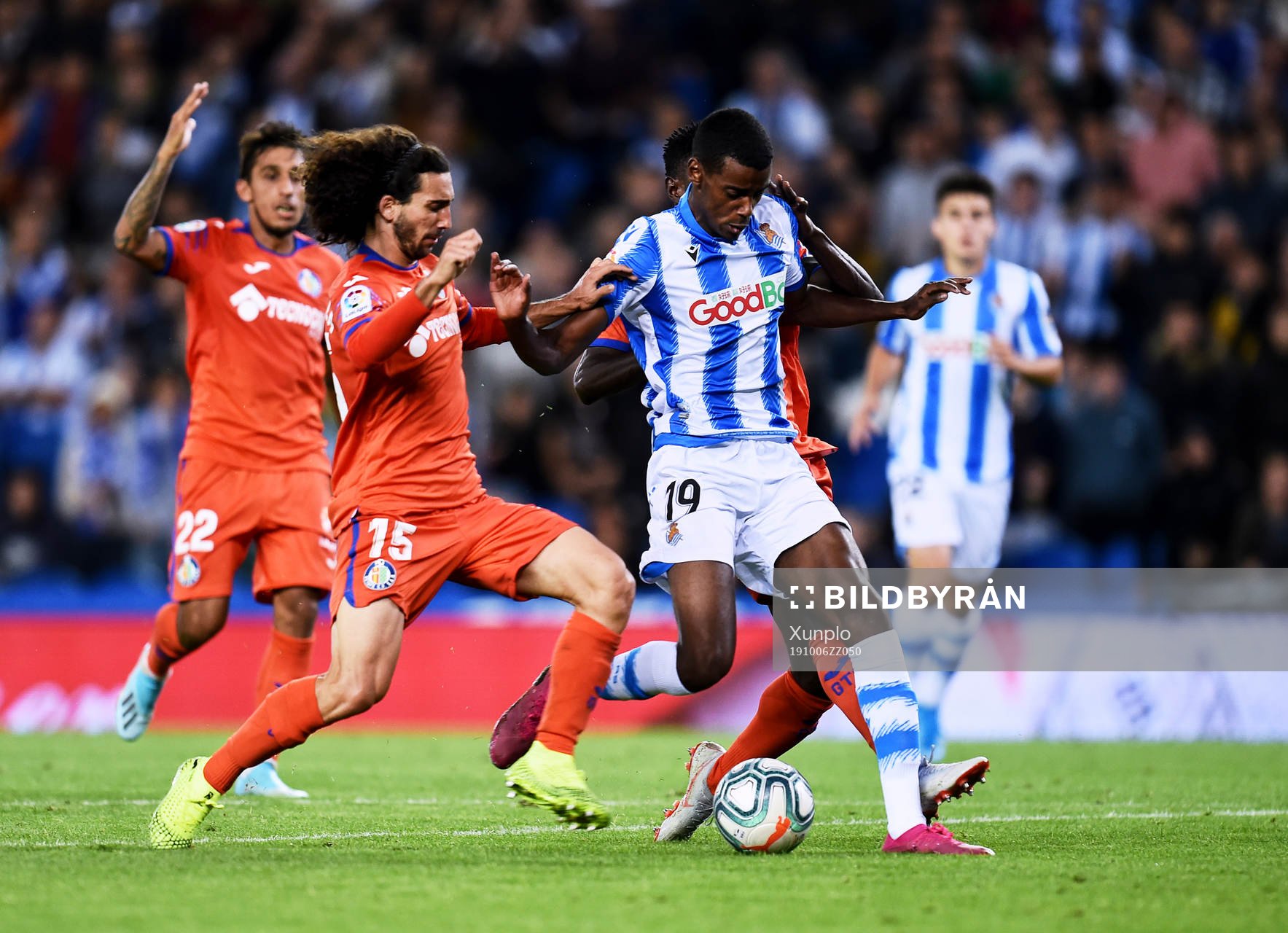 Alexander Isak of Real Sociedad battles for the ball with