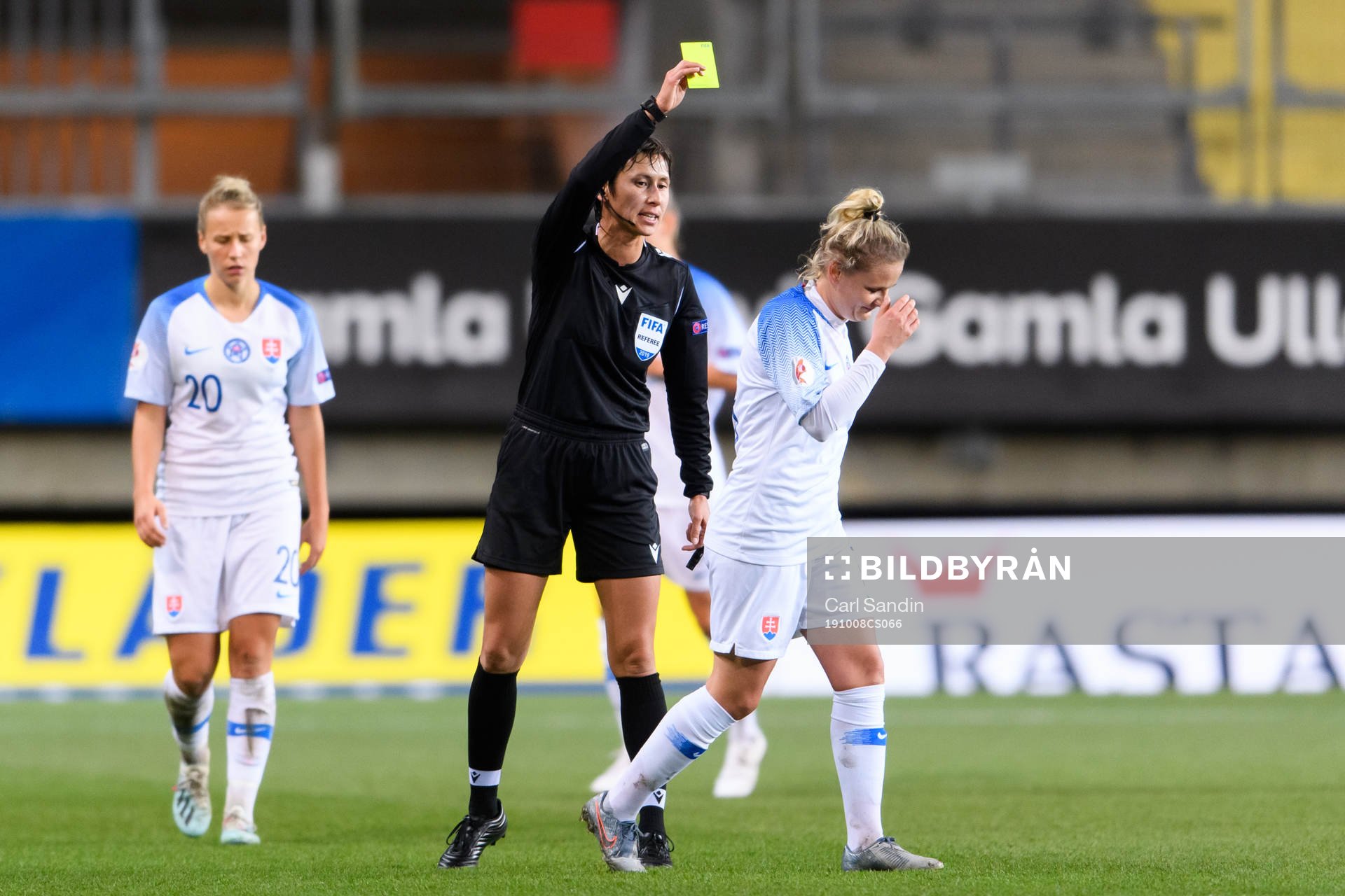 Dominika Skorvankova of Slovakia is shown a yellow card