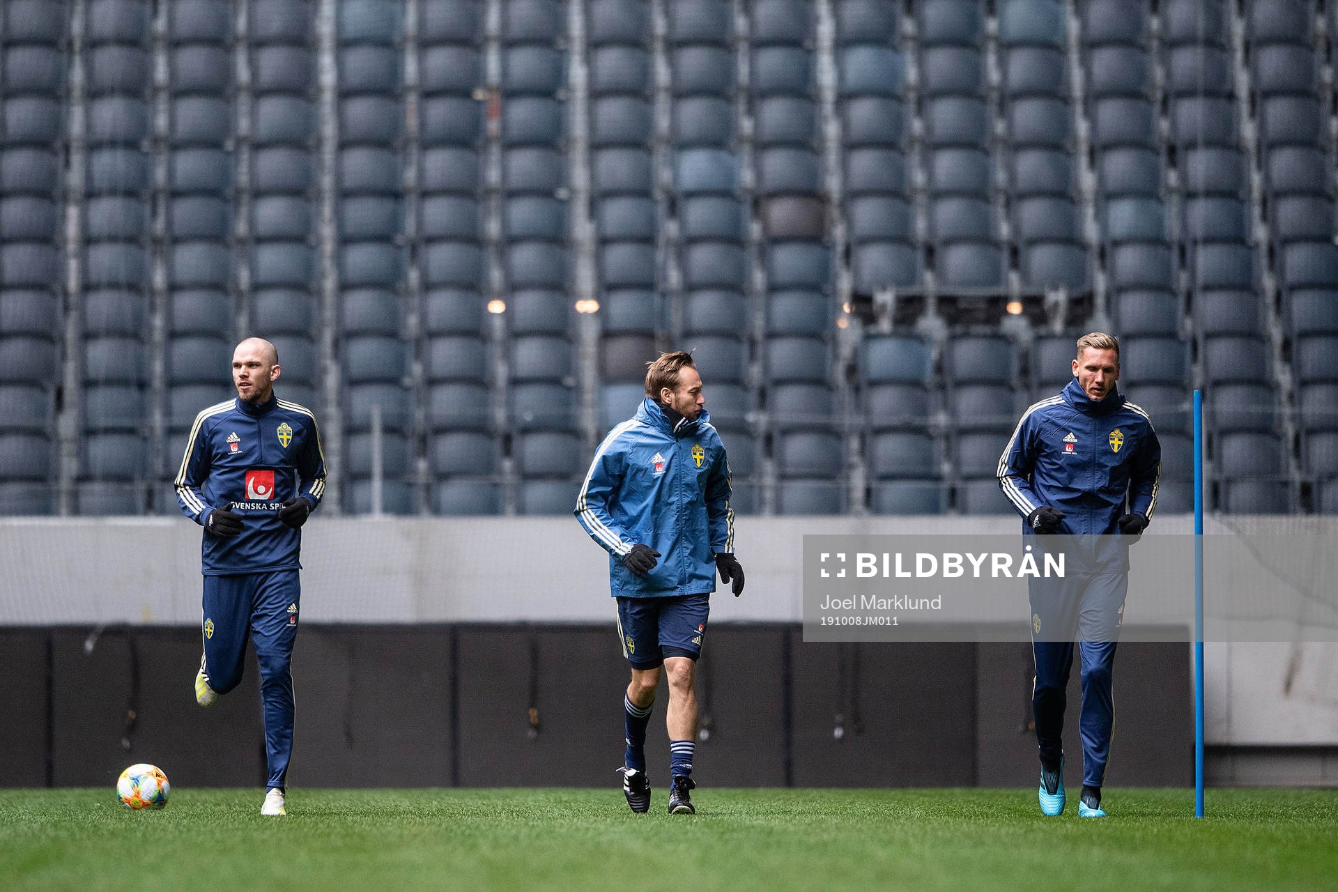 Marcus Danielson and goalkeeper Robin Olsen of the Swedish