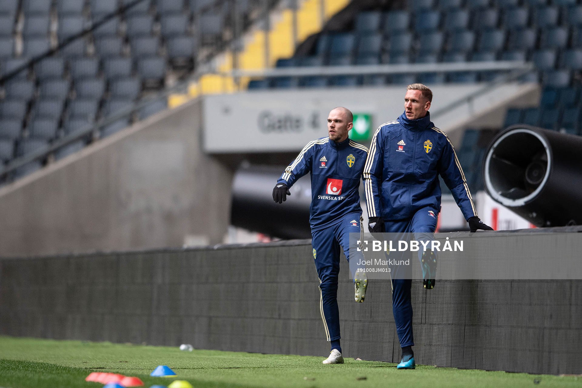 Marcus Danielson and goalkeeper Robin Olsen of the Swedish