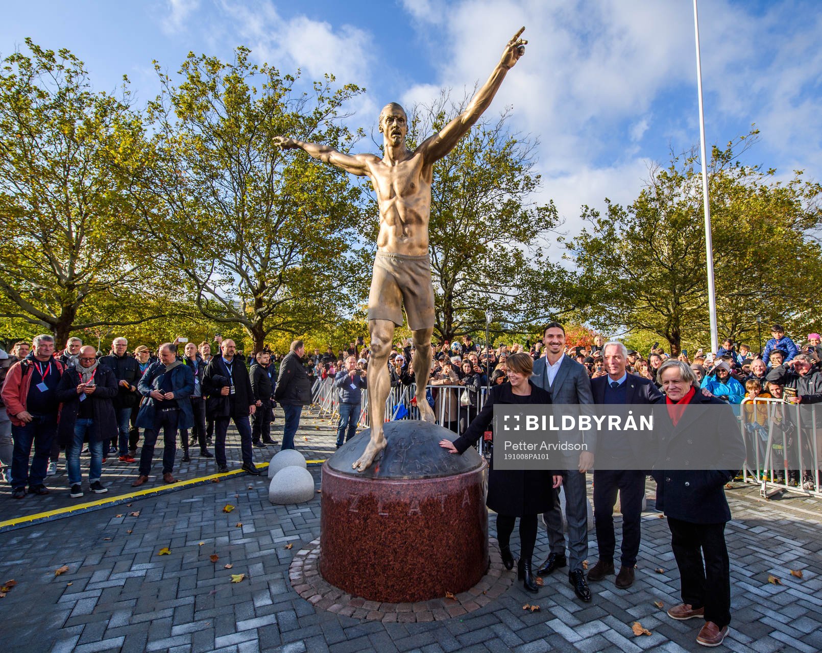 Peter Linde, artist, Katrin Stjernfeldt Jammeh, Chairwoman Malmö City Council, Zlatan Ibrahimović and Håkan Sjöstrand, General Secretary of the Swedish Football Association pose besides Zlatan Ibrahimović statue at the revealing ceremony at Stadiontorget on October 8, 2019 in Malmö.