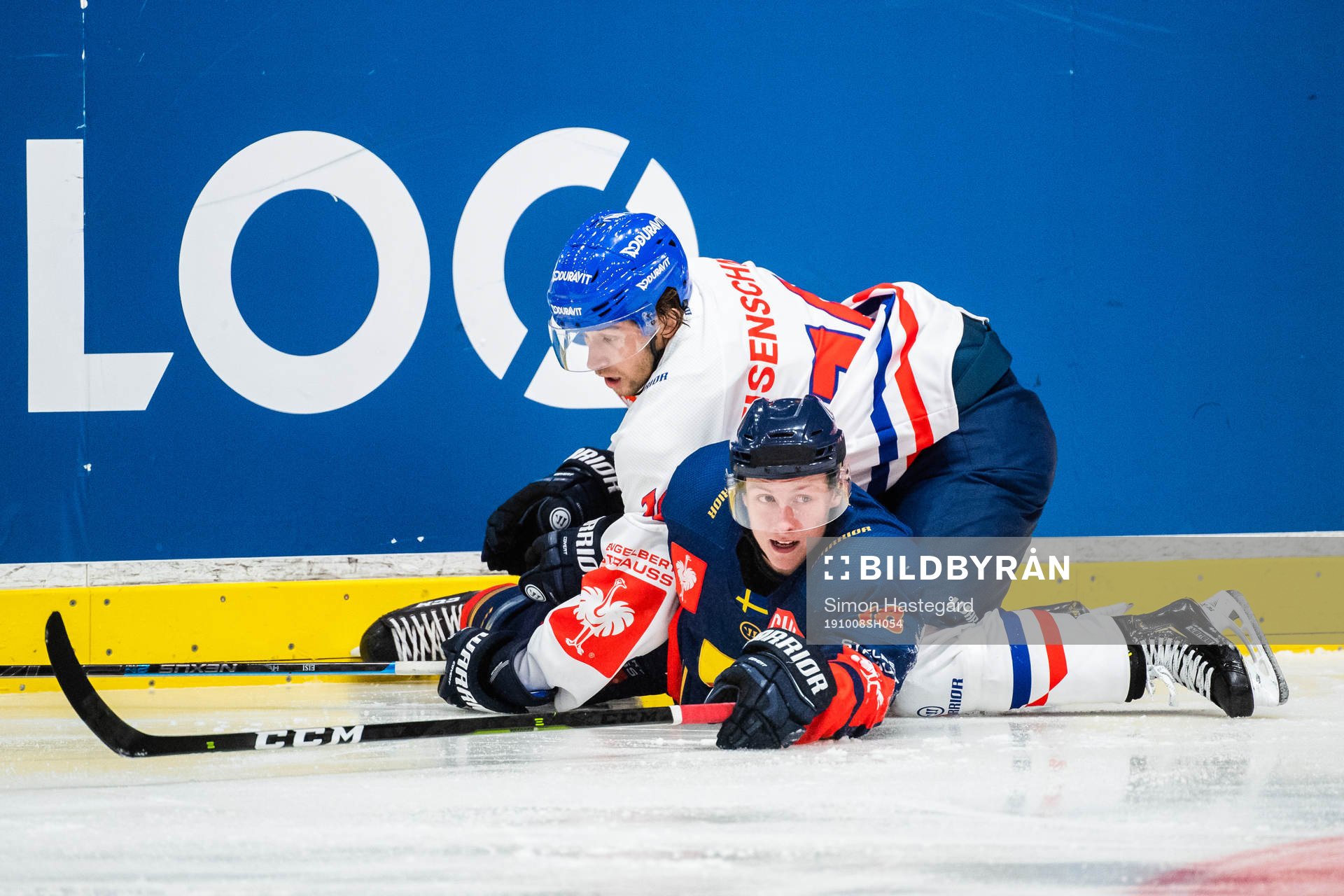 Markus Eisenschmid  of Adler Mannheim and Simon Johansson