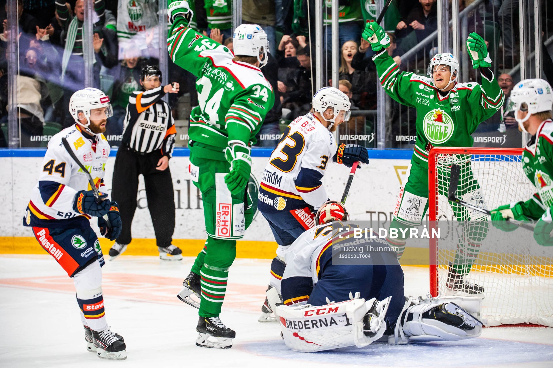 Rögles Hampus Gustafsson jublar med Adam Edström
