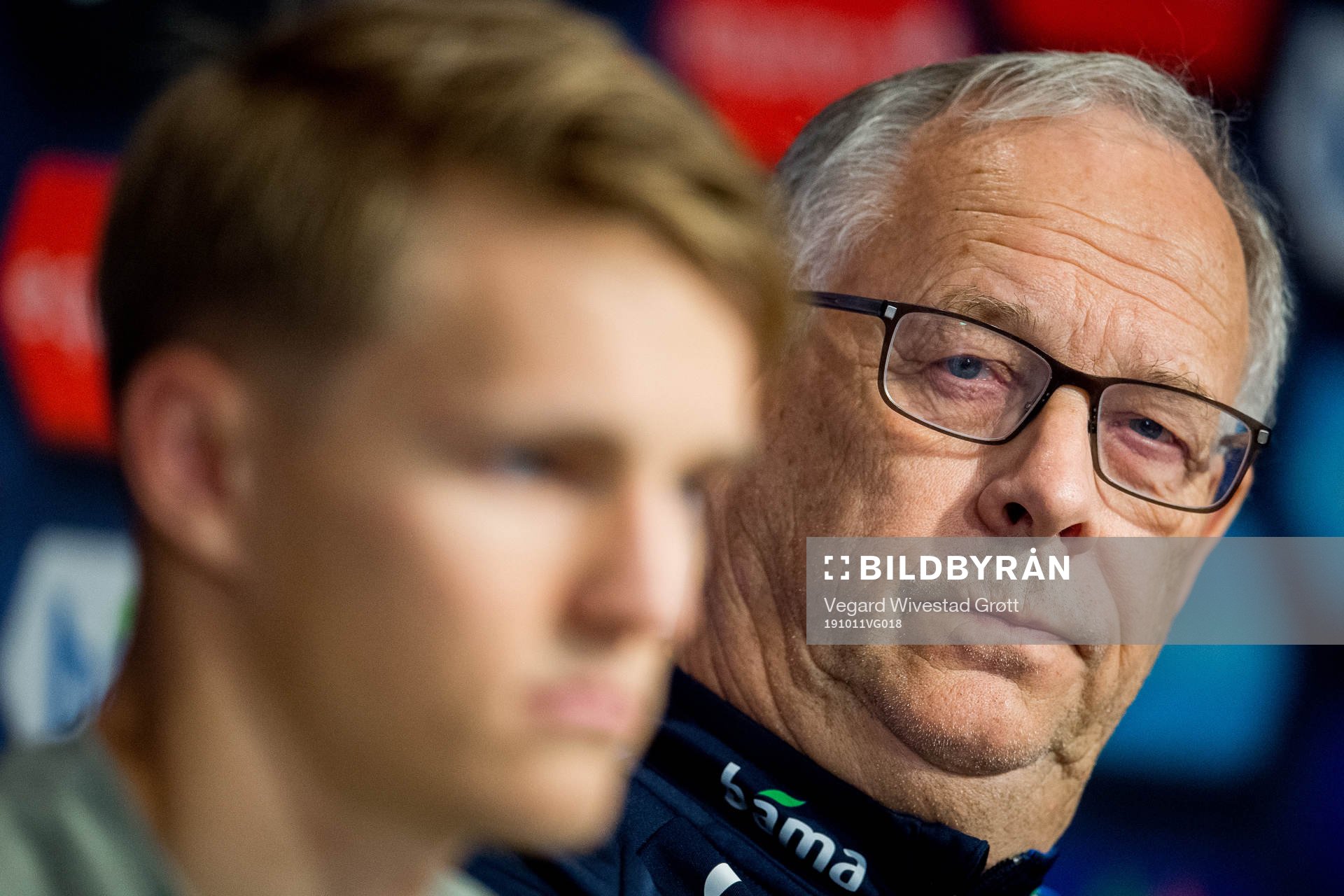 Lars Lagerbäck, head coach of Norway, listens to Martin