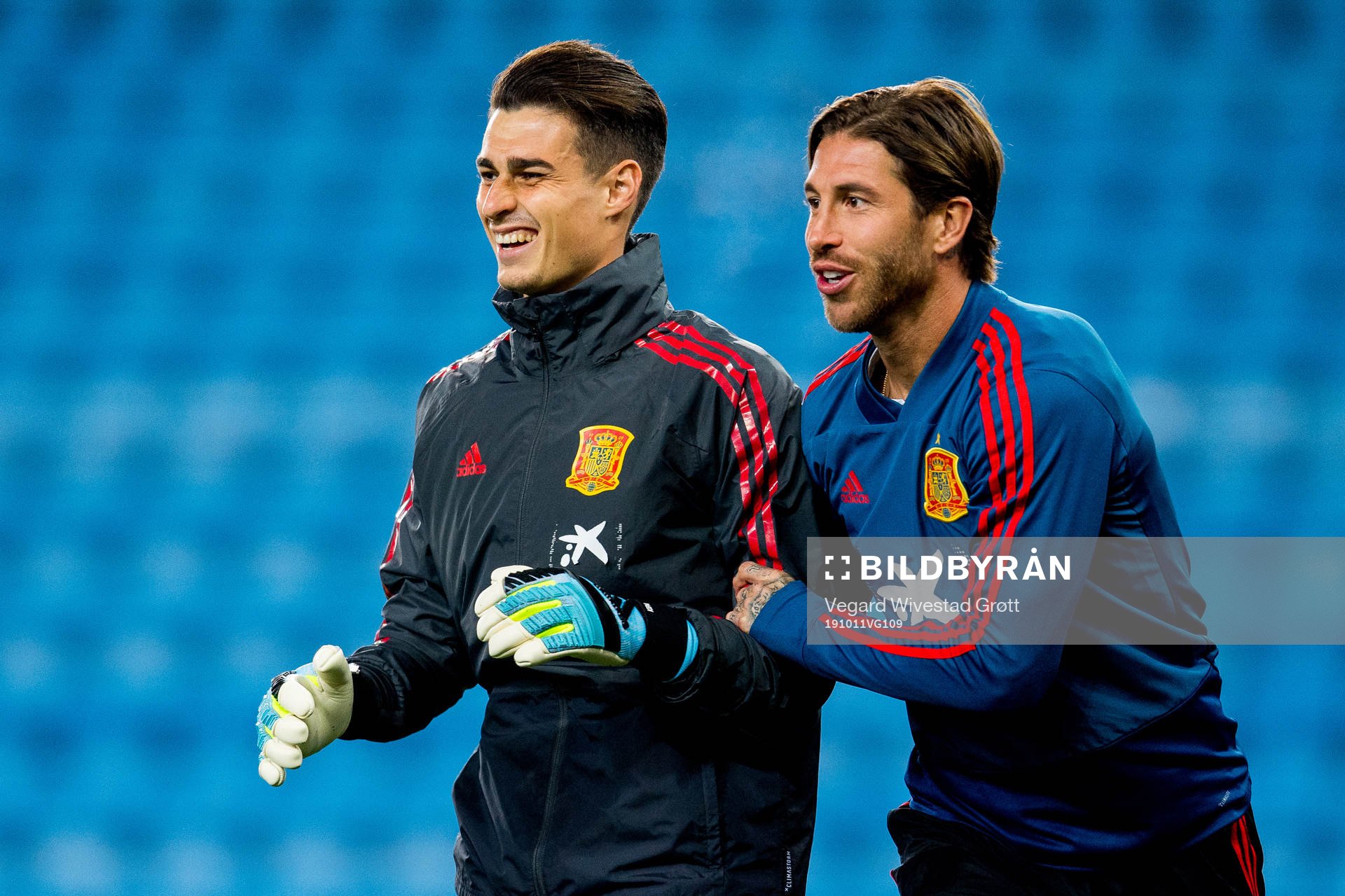 Goalkeeper Kepa Arrizabalaga and Sergio Ramos of Spain