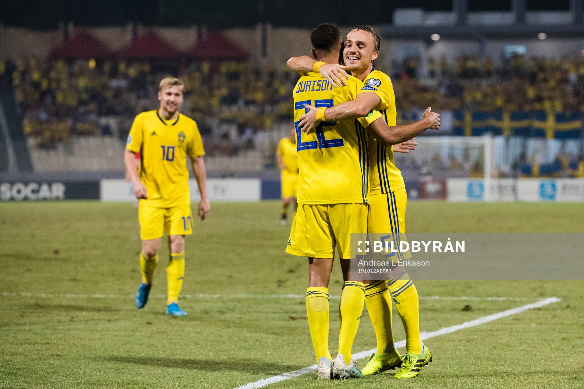 Robin Quaison and Pierre Bengtsson of Sweden celebrates