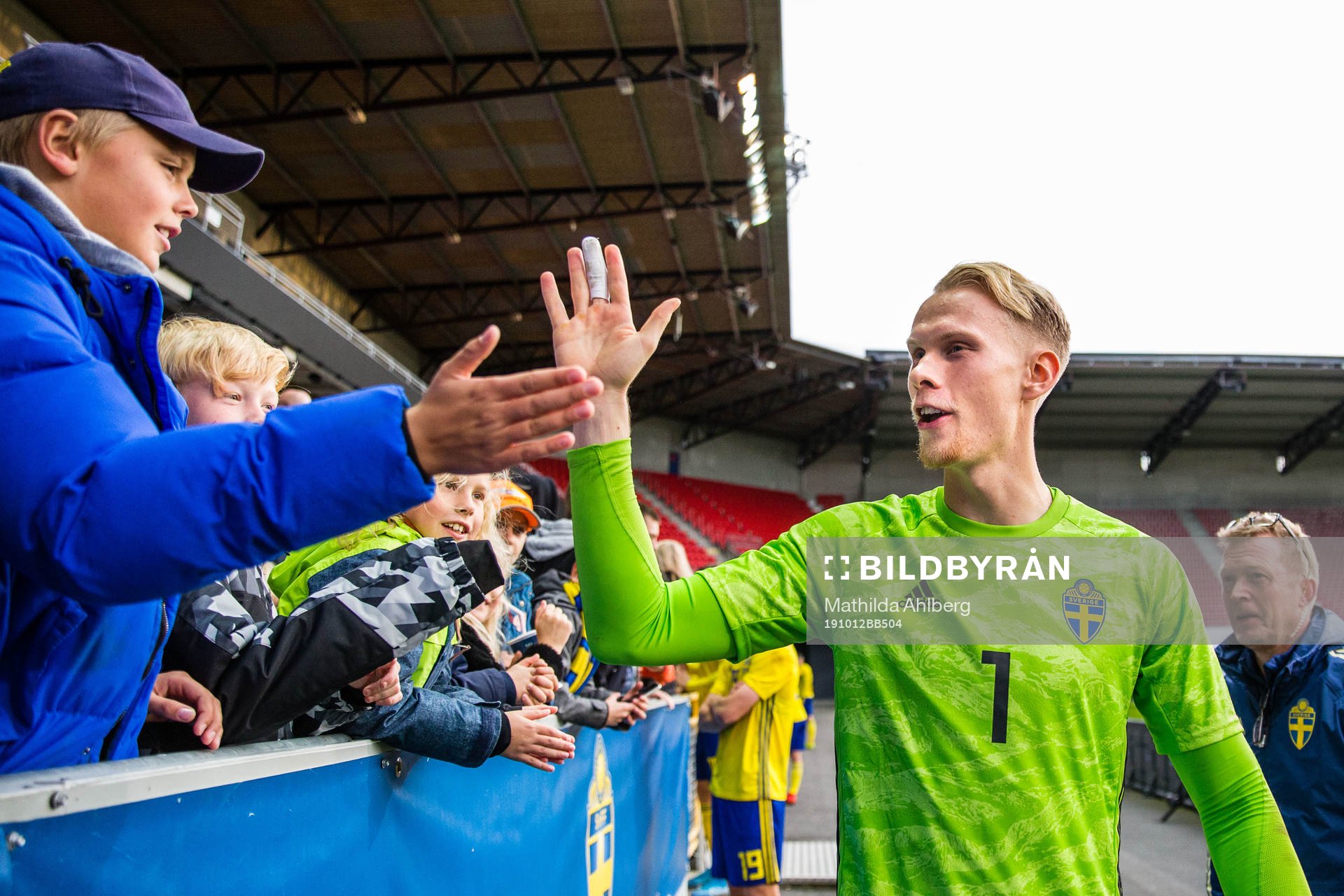 Goalkeeper Pontus Dahlberg of Sweden celebrates with fans