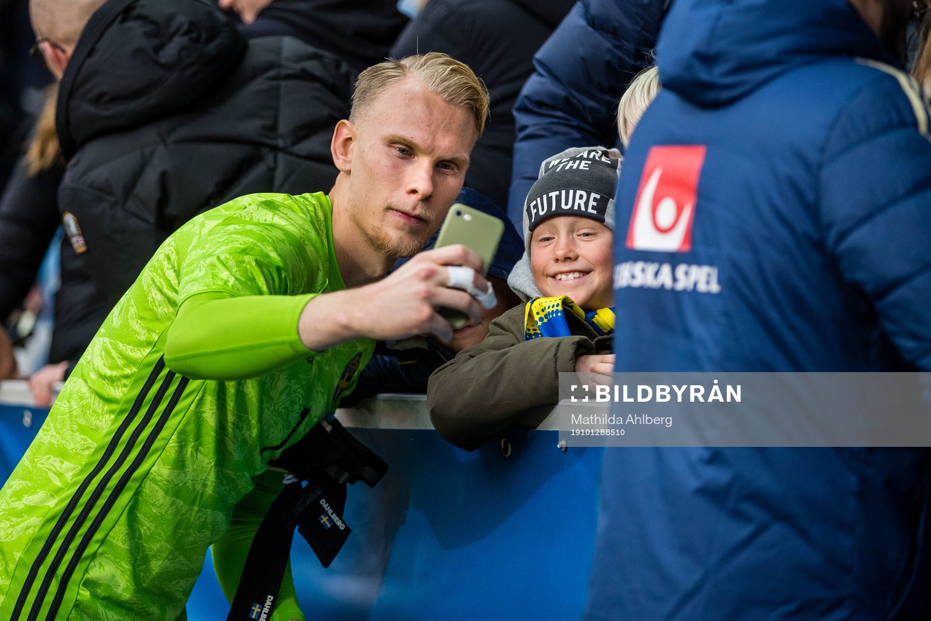 Goalkeeper Pontus Dahlberg of Sweden celebrates with fans