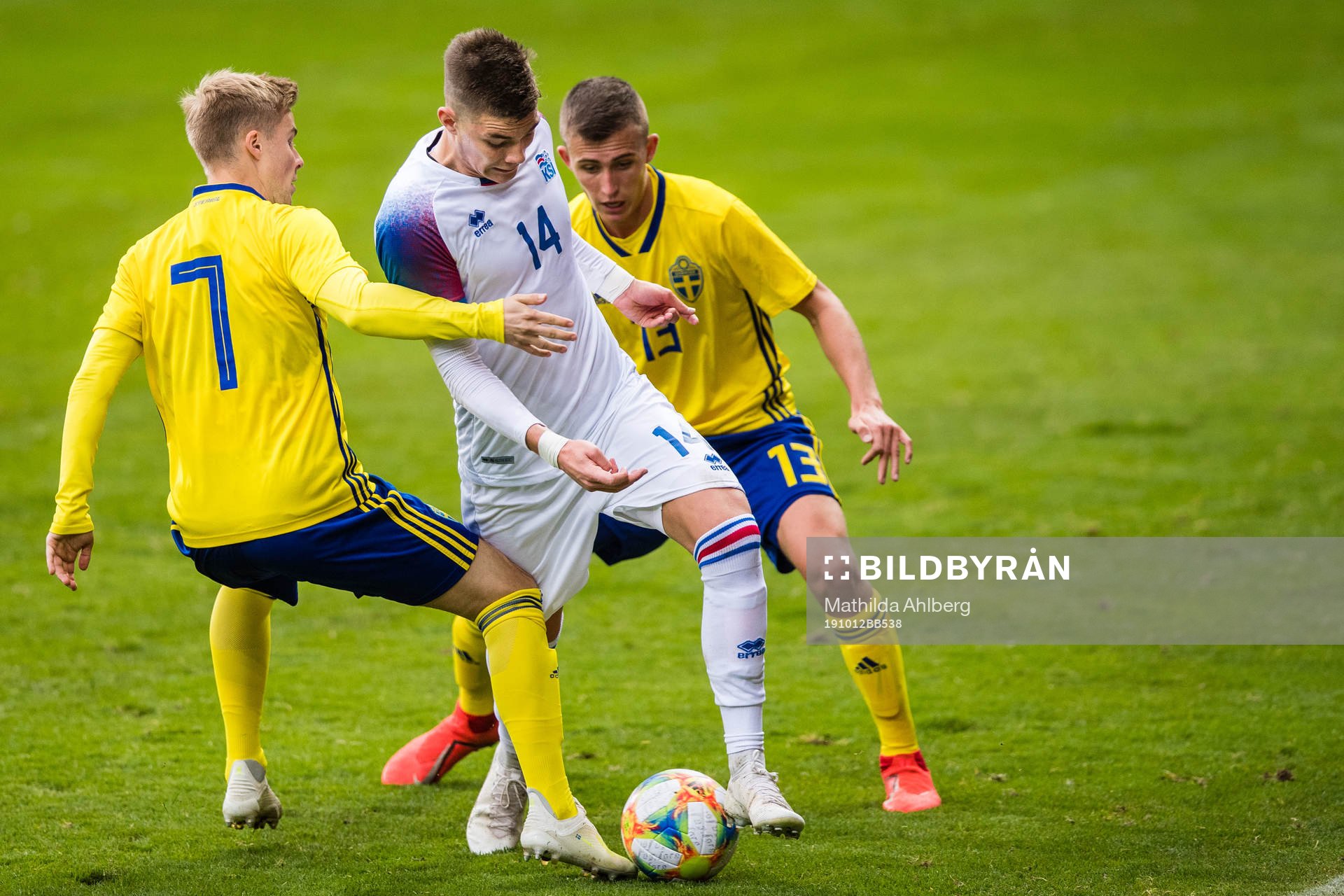 Emil Hansson and John Björkengren of Sweden and Brynjolfur Darri Willumsson of Iceland during the UEFA European Under-21 Qualifier football match between Sweden and Iceland on October 12, 2019 in Helsingborg.