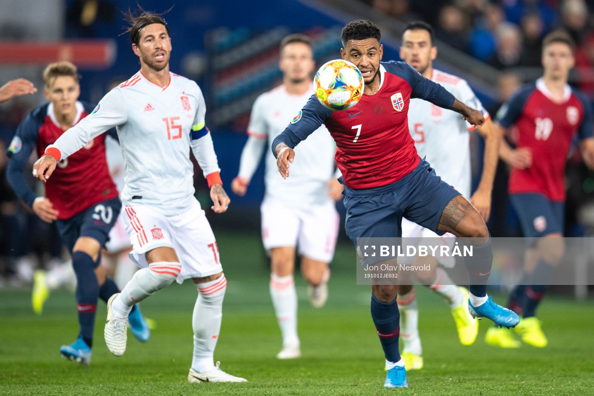 Sergio Ramos of Spain and Joshua King of Norway